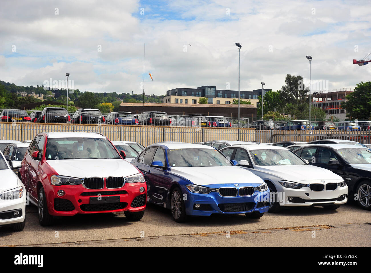 Brand new BMW cars still covered in white tape at a BMW dealership in Bath. Stock Photo