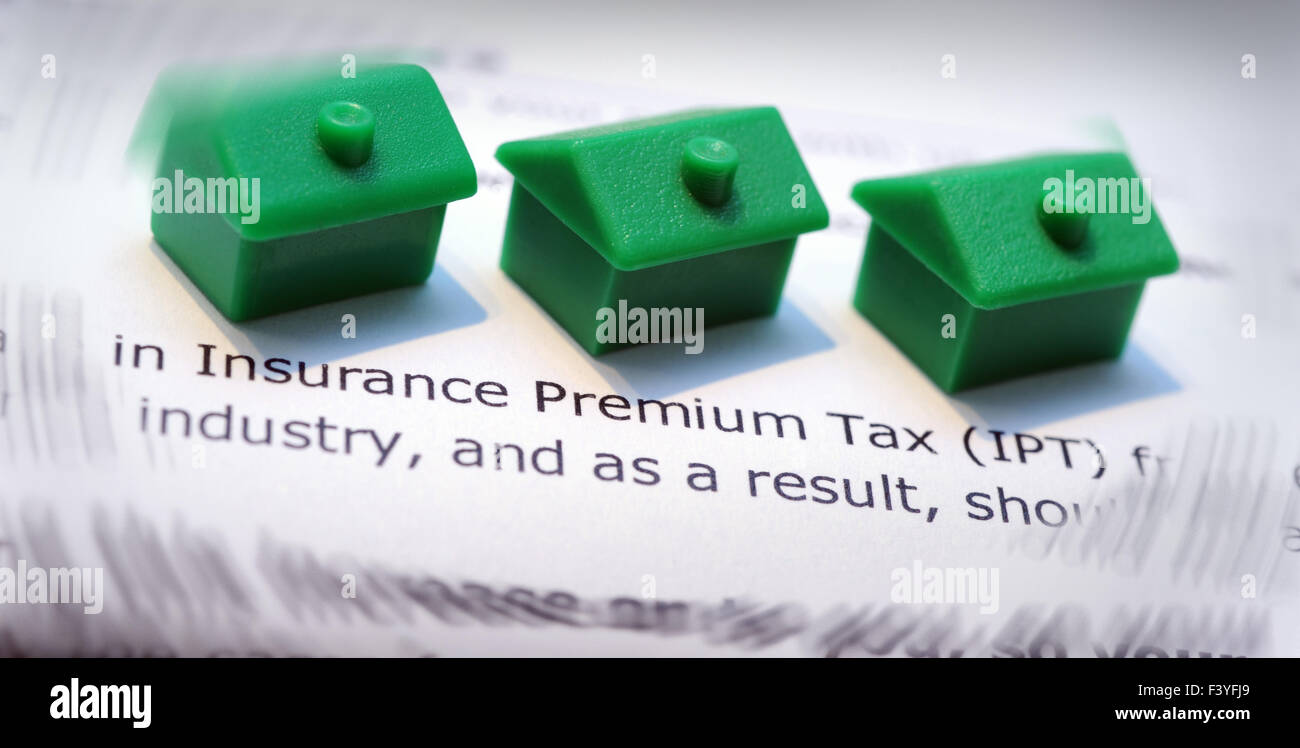 SMALL HOUSES WITH INSURANCE PREMIUM TAX LETTER RE HOUSE INSURANCE INCREASE GOVERNMENT TAXES IPT HOUSEHOLDER BUDGET HOMES  UK Stock Photo