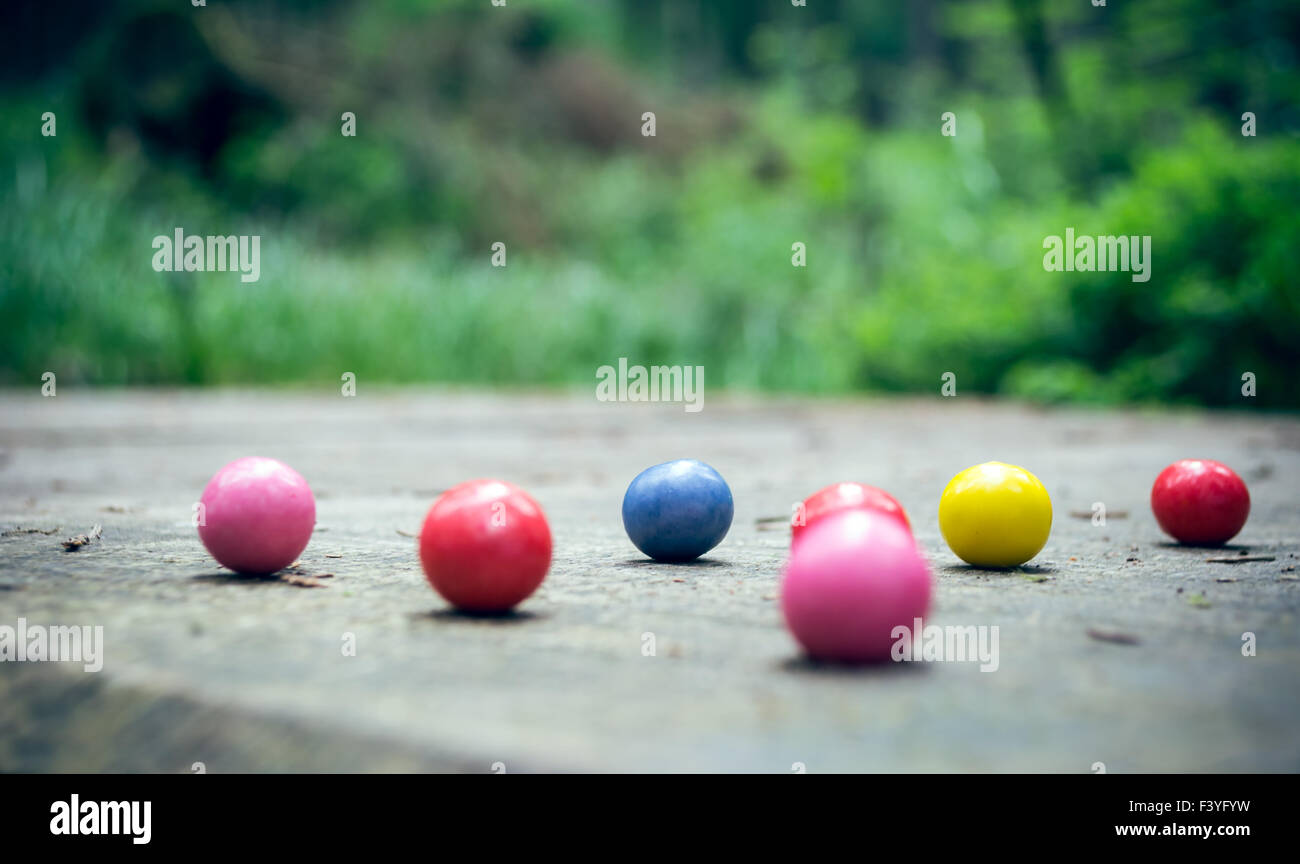 Bubble gum balls in the forest Stock Photo