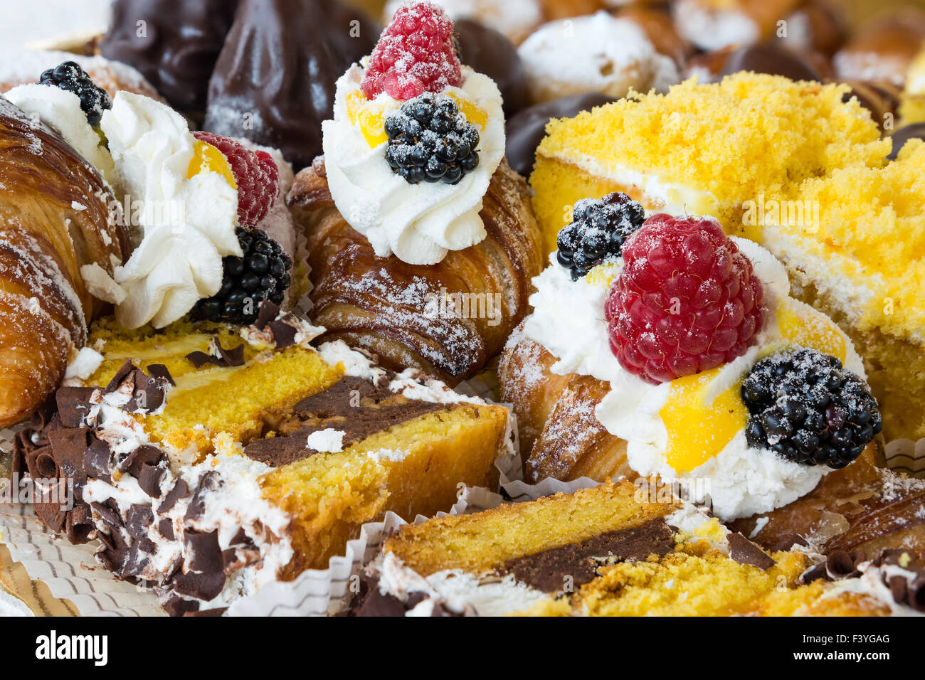 In the pictured typical italian pastries with cream,choccolate,rasperry