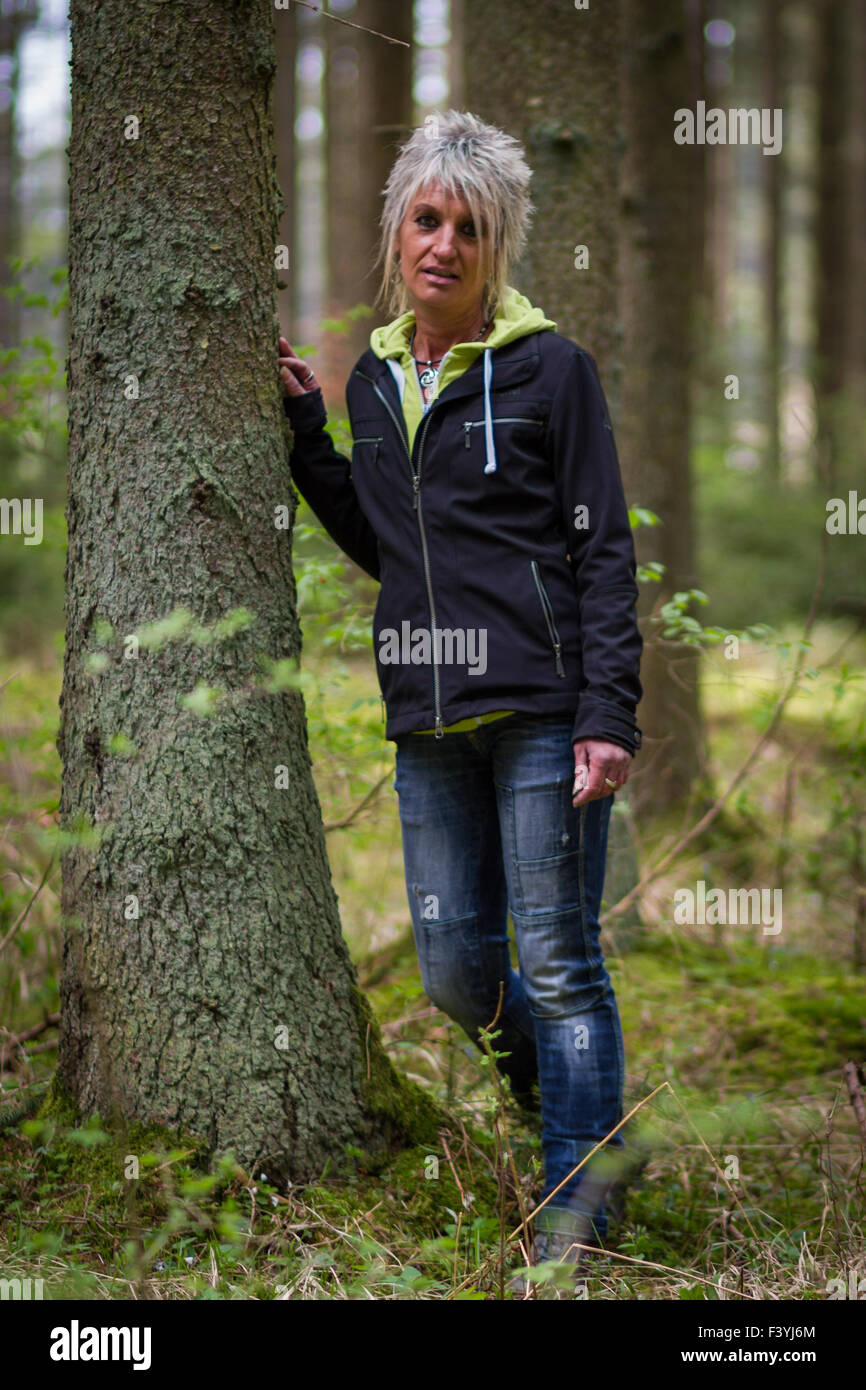 Woman in forest hi-res stock photography and images - Alamy