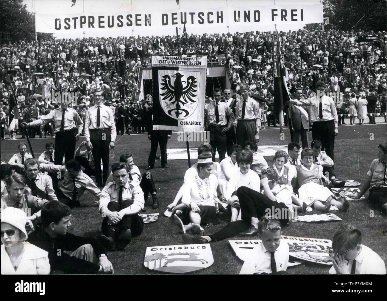 June 16, 1963 - Great meeting of the East Prussia-men in Dusseldorf In this day there is a great meeting of the East Prussia-men in Dusseldorf. The Eastern refugees demand at last 18 years after the second world-war the restitution of the German East countries to Germany which are all now under the Polish and the Russian governments. Today therefore war a great demonstration in the Rheinstadion in Dusseldorf where spoke the German Defence Minister Von Hassel, Our foto shows young East-Prussia-men during the great demonstration today in the Rheinstadion in Dusseldorf. Keystone Koln, 16.6.1963 ( Stock Photo