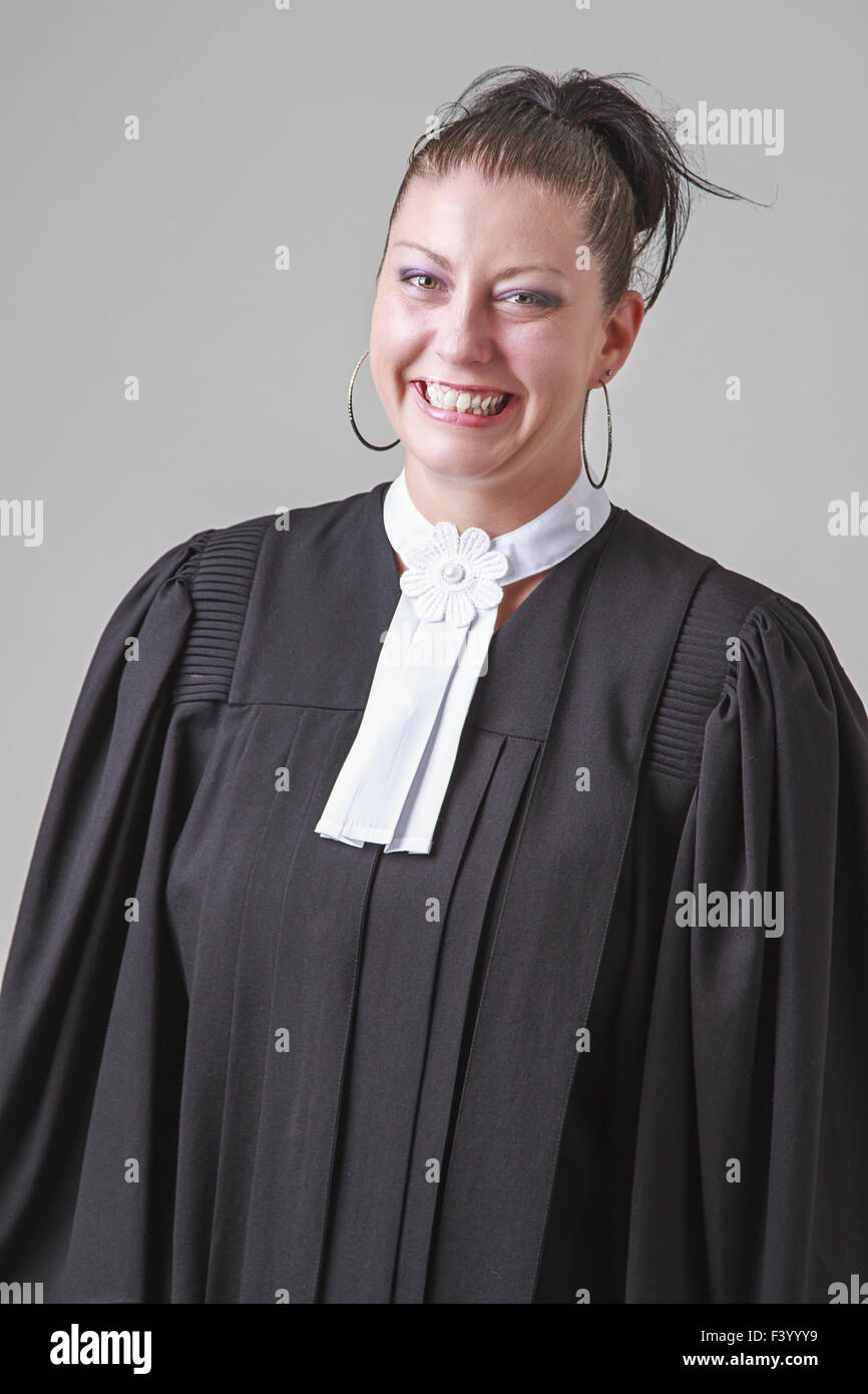 Woman lawyer attorney wearing classic polish gown with file folder Stock  Photo by ©Voyagerix 42958621
