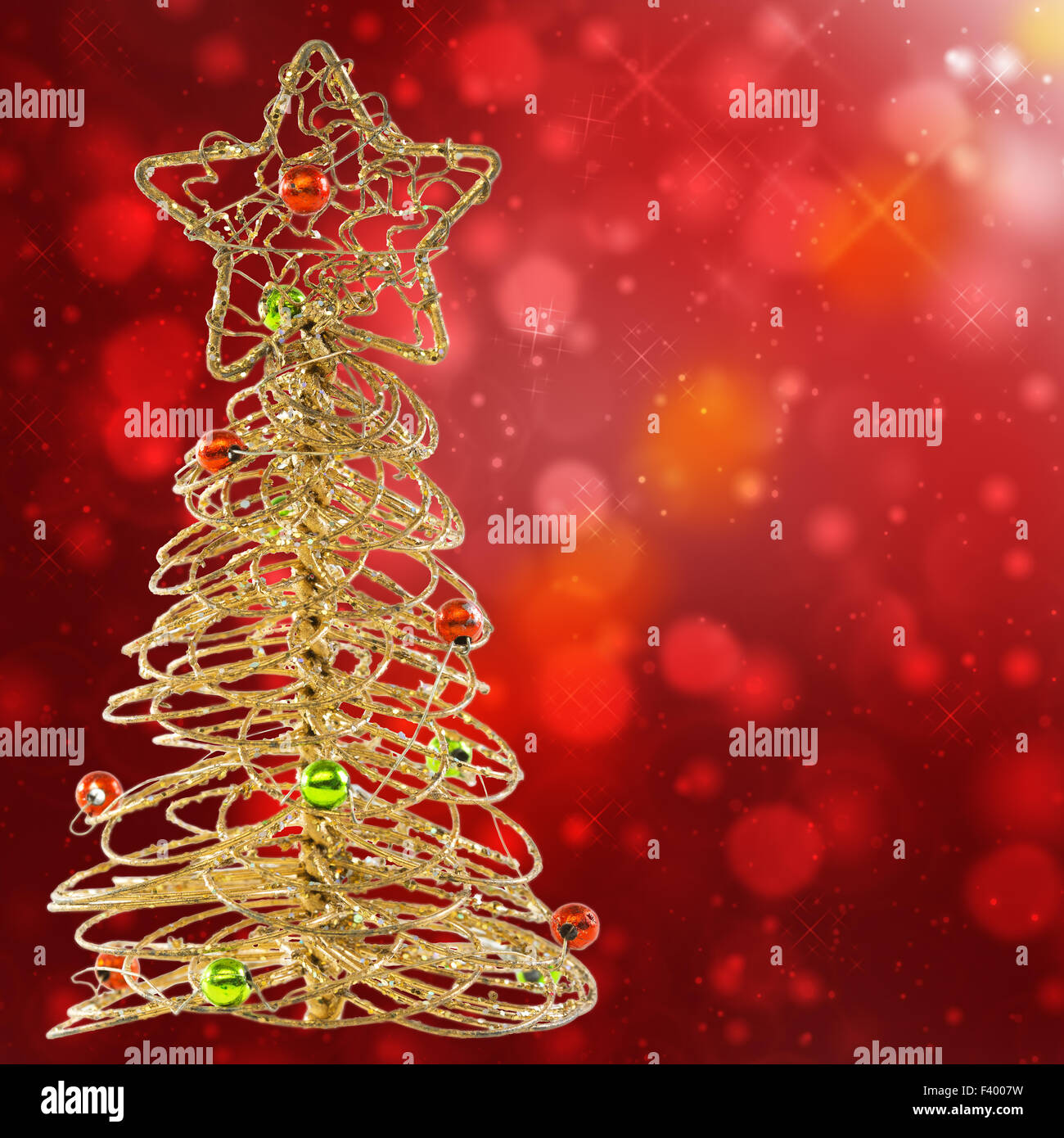 Card with golden Christmas tree. Stock Photo