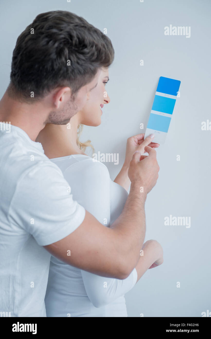 Caucasian Couple Looking at Color Indicator Paper Stock Photo