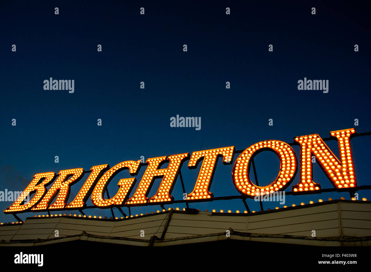 Lighted Brighton sign on the pier at evening, East Sussex, England Stock Photo