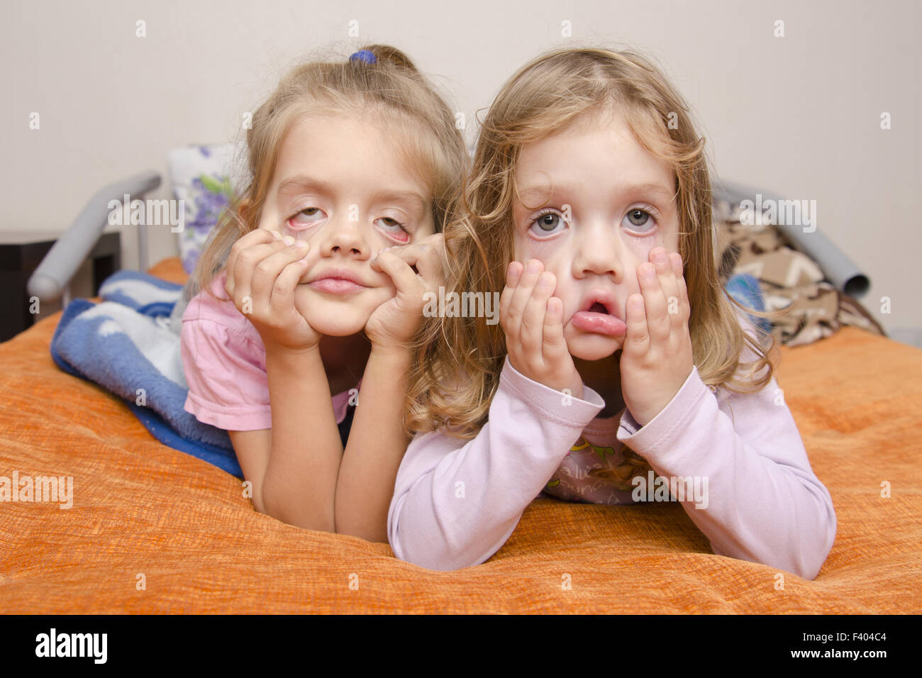 two girls pulled a terrible faces Stock Photo
