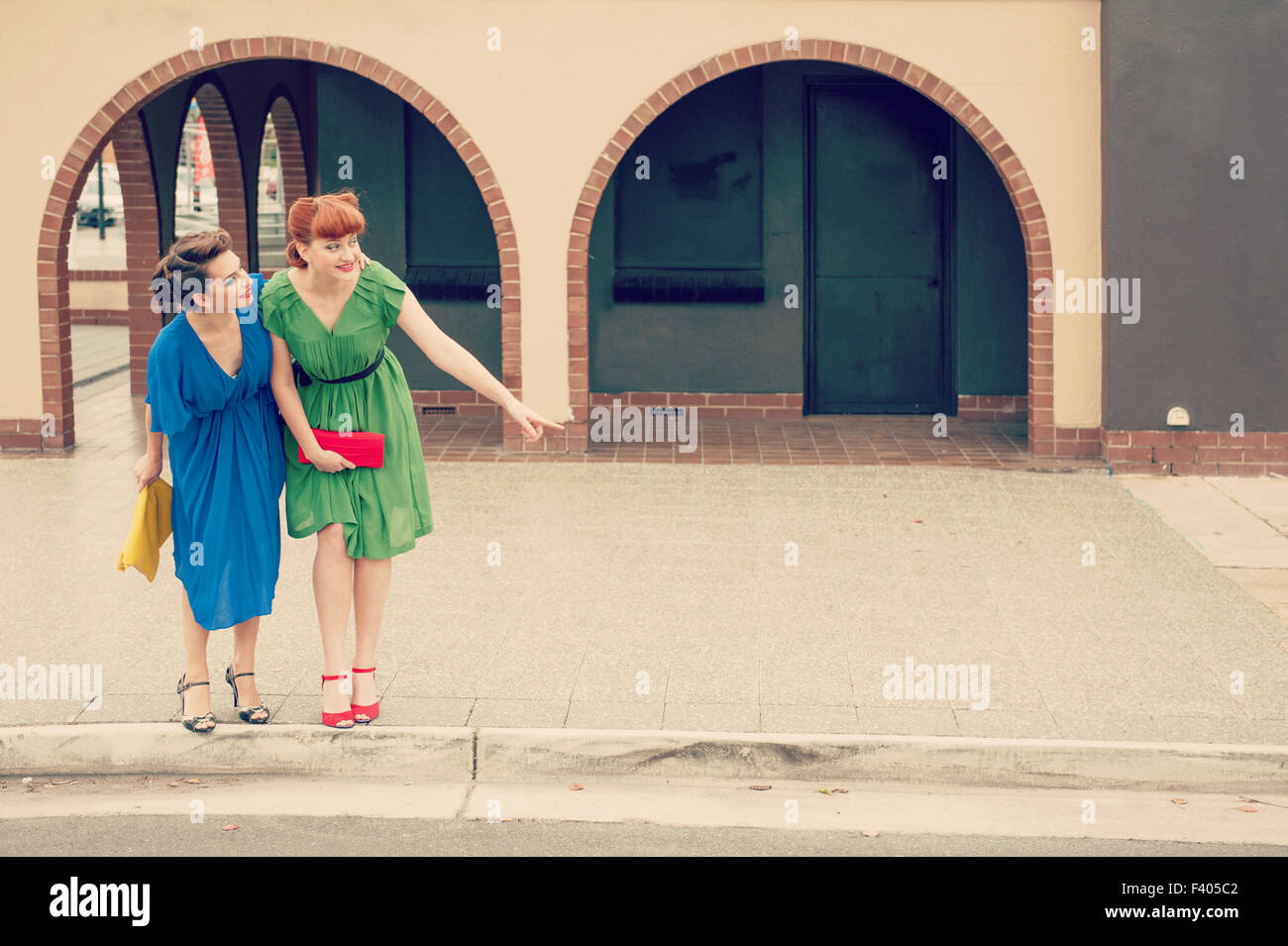 Urban scene with young women Stock Photo - Alamy