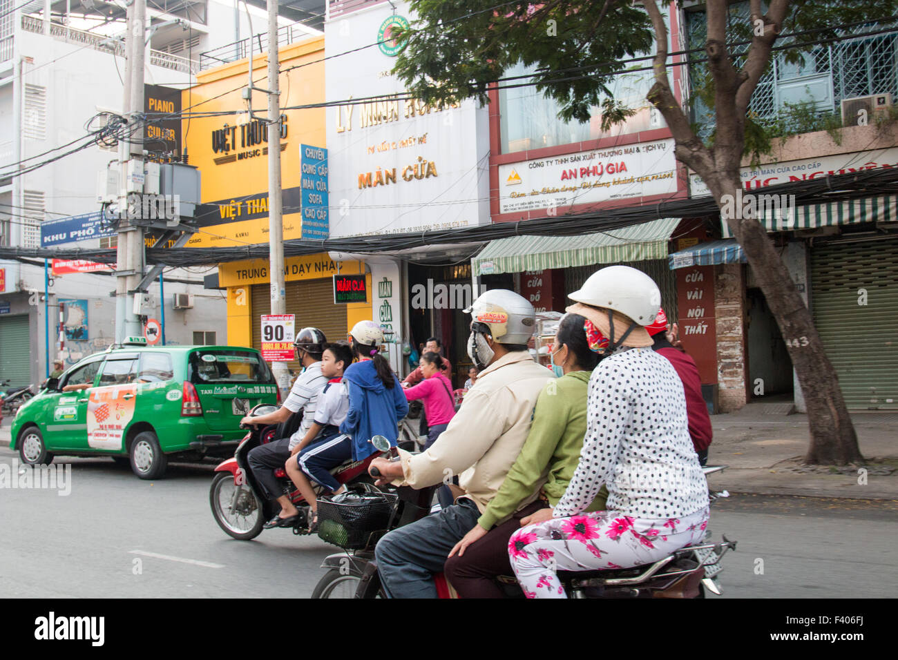 there are over 45 million scooters in Vietnam, here street scene in Ho Chi Minh formerly Saigon,Vietnam Stock Photo