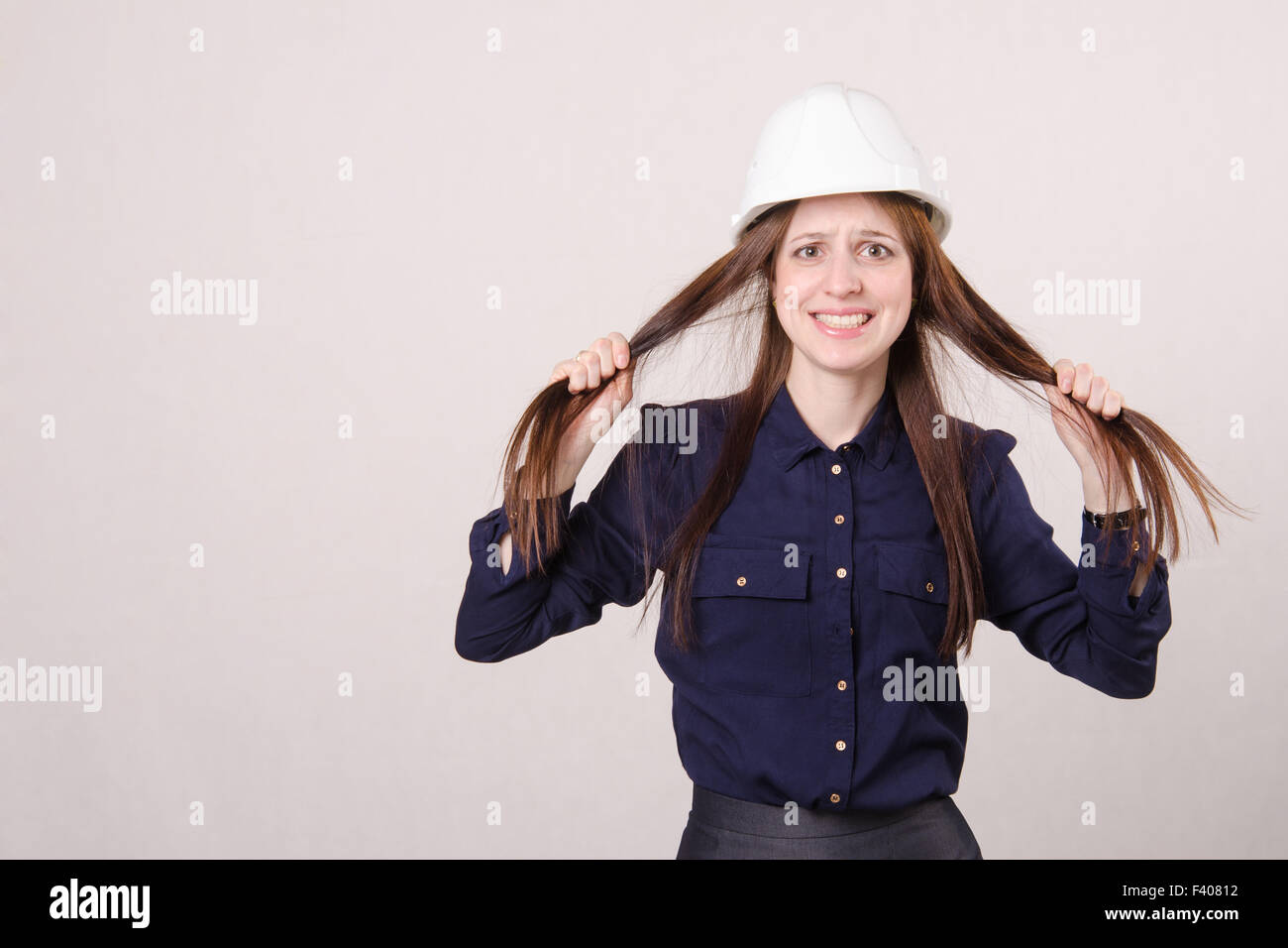 Young girl in shock tearing my hair out Stock Photo