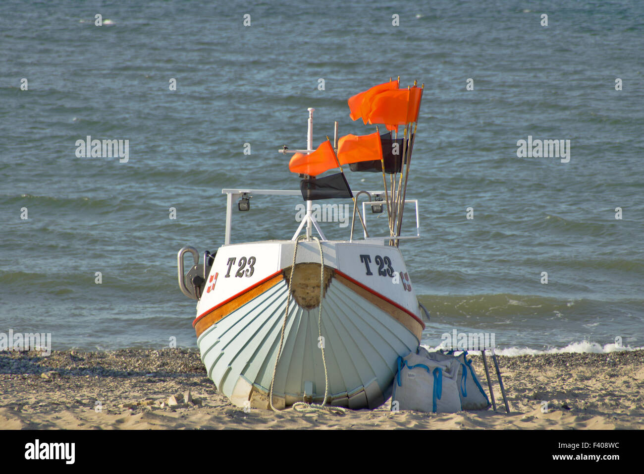 Fishing boat with Flags Stock Photo - Alamy
