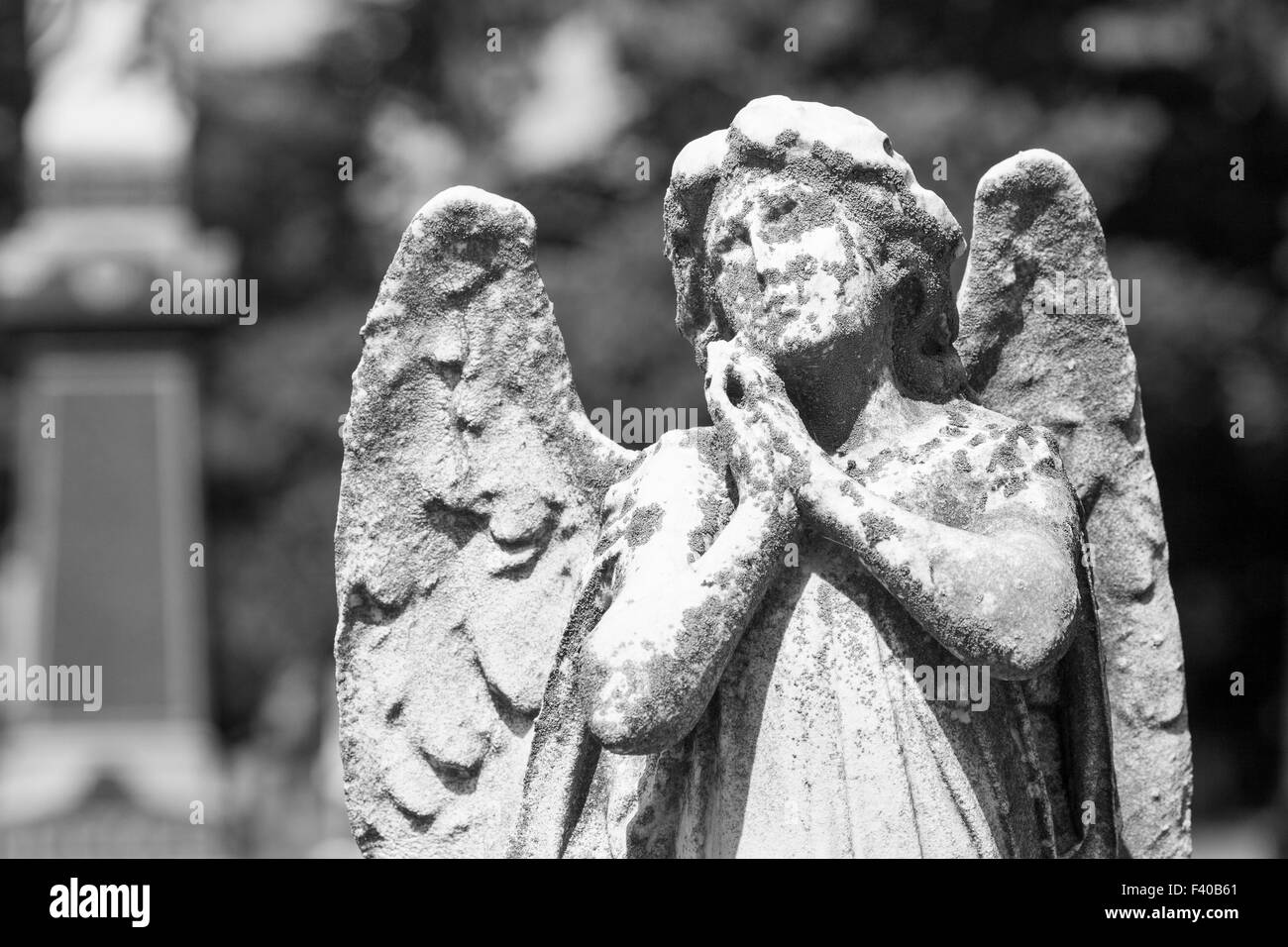 Weather Worn Cemetery Angel Statue Stock Photo