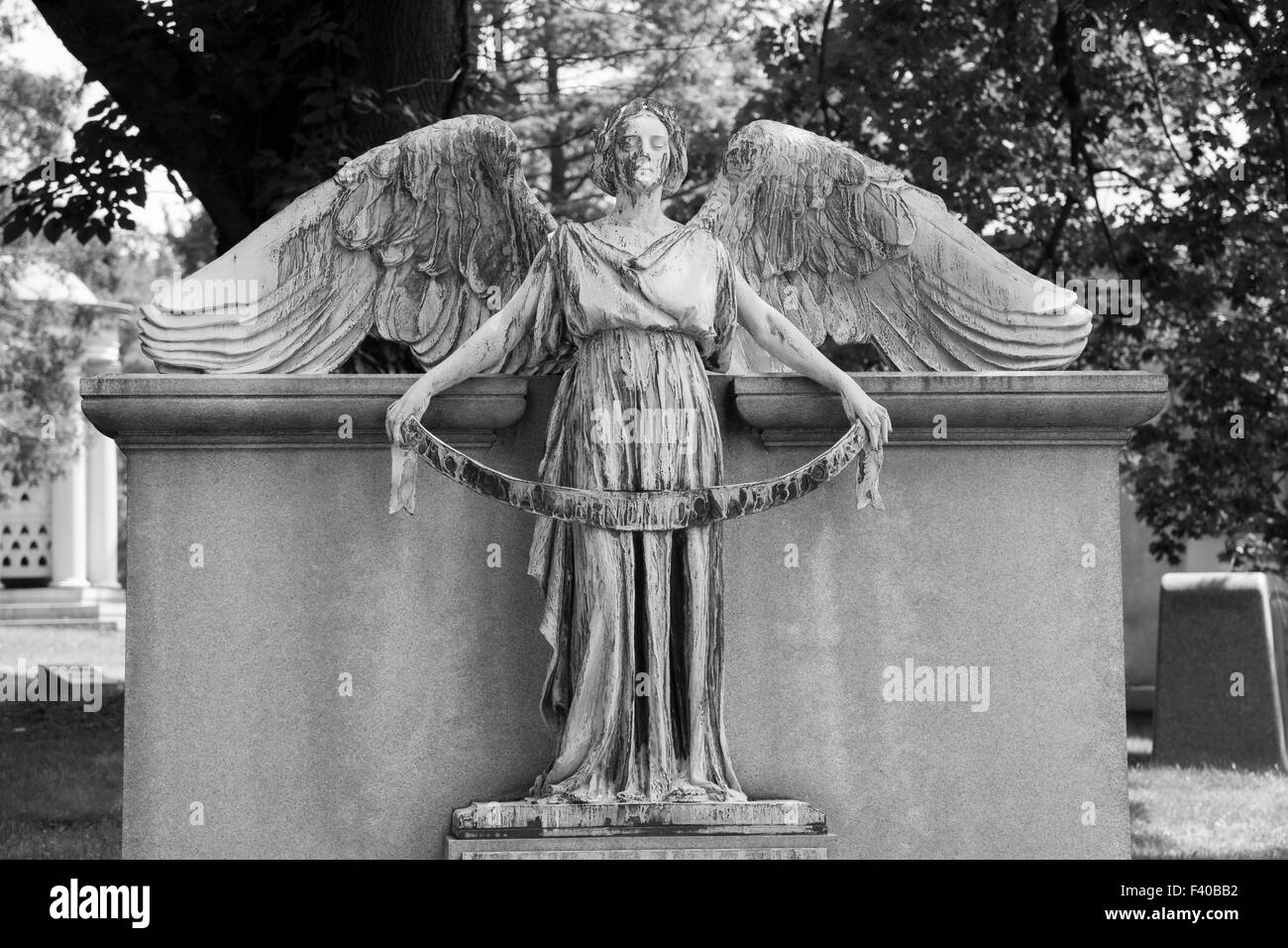 Female Cemetery Angel Spreading Her Wings Stock Photo