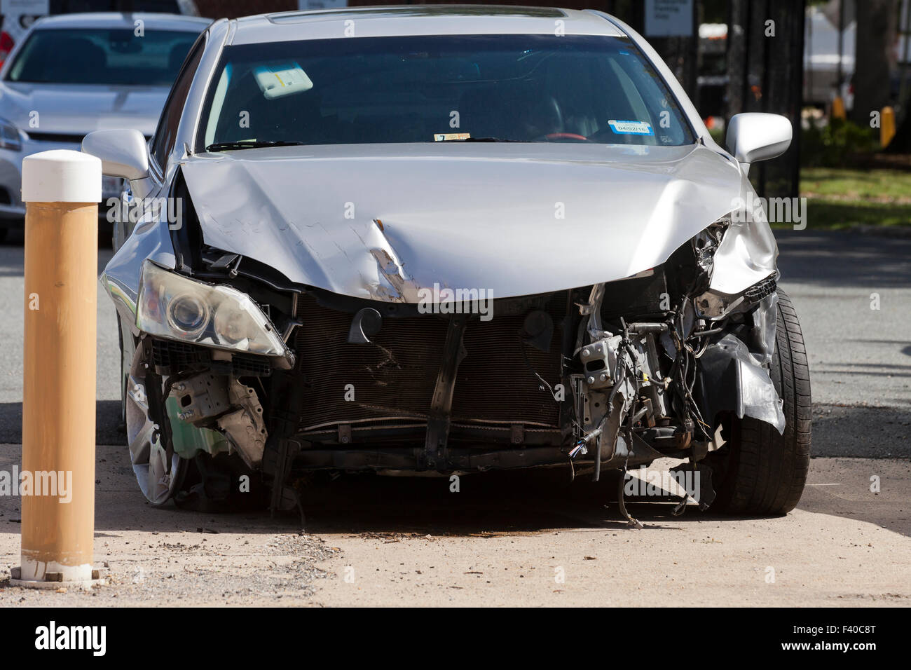 Car with front end collision damage - USA Stock Photo