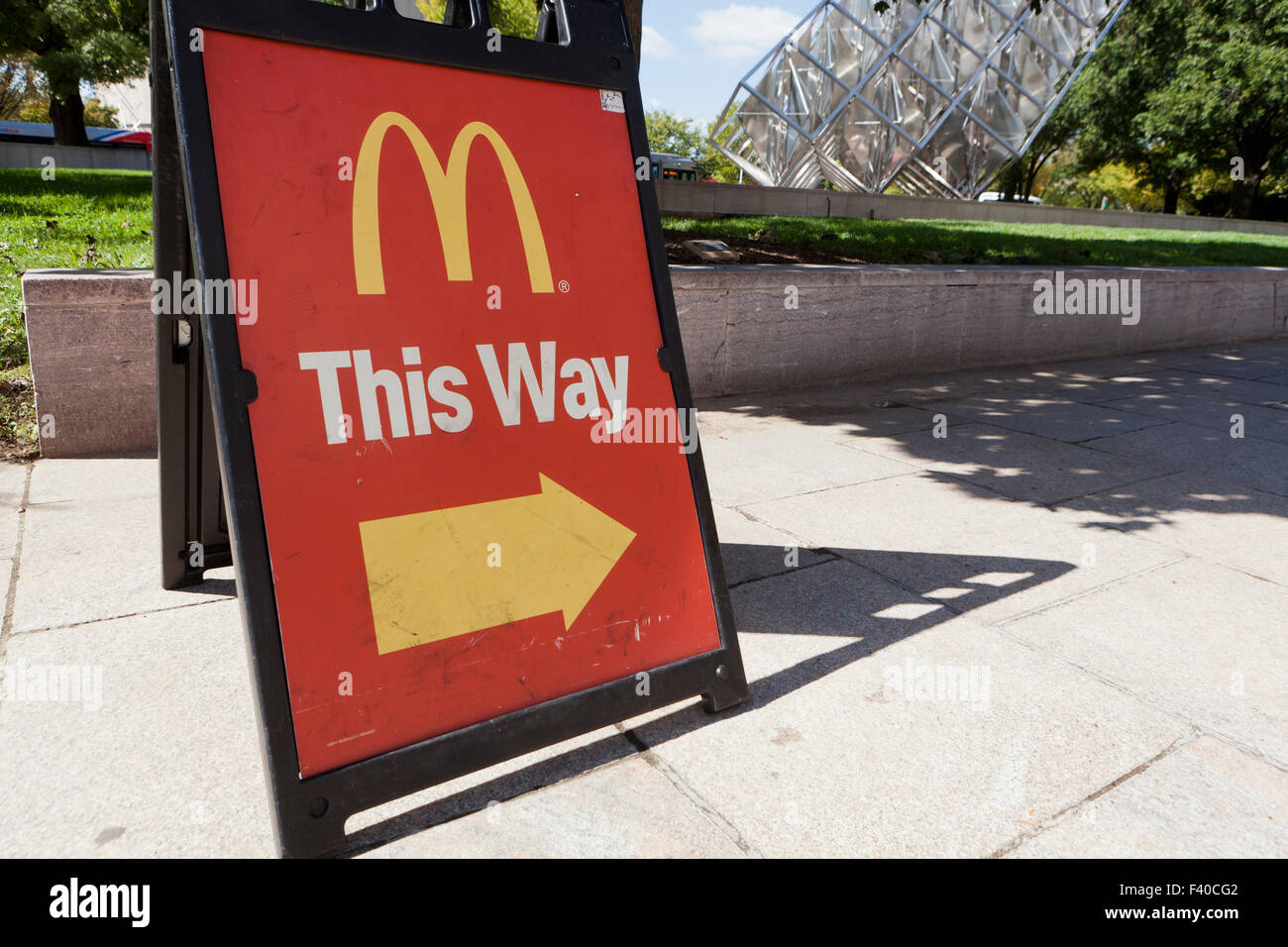 A-frame sign for McDonalds on sidewalk - USA Stock Photo