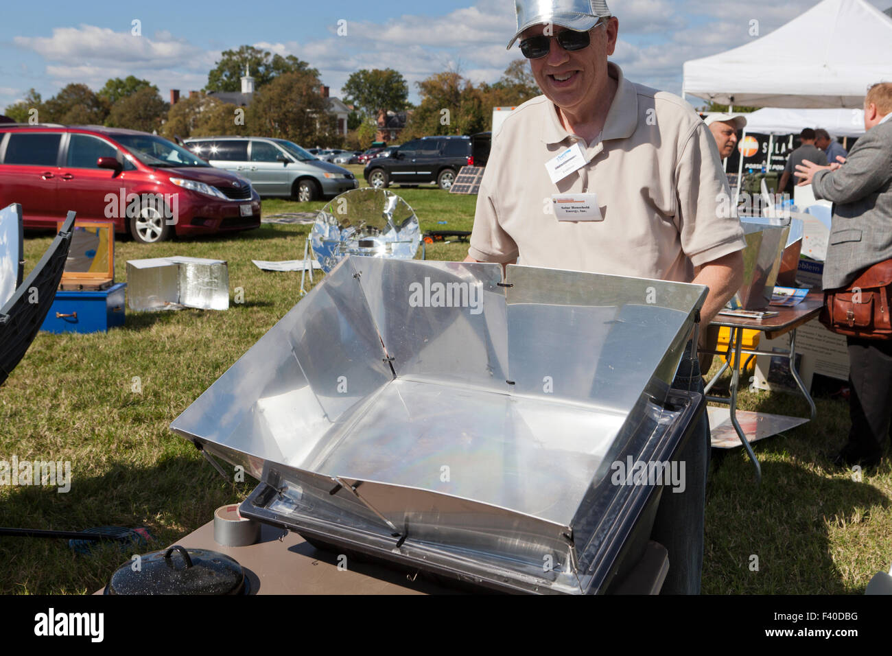 Man demonstrating a solar oven - USA Stock Photo