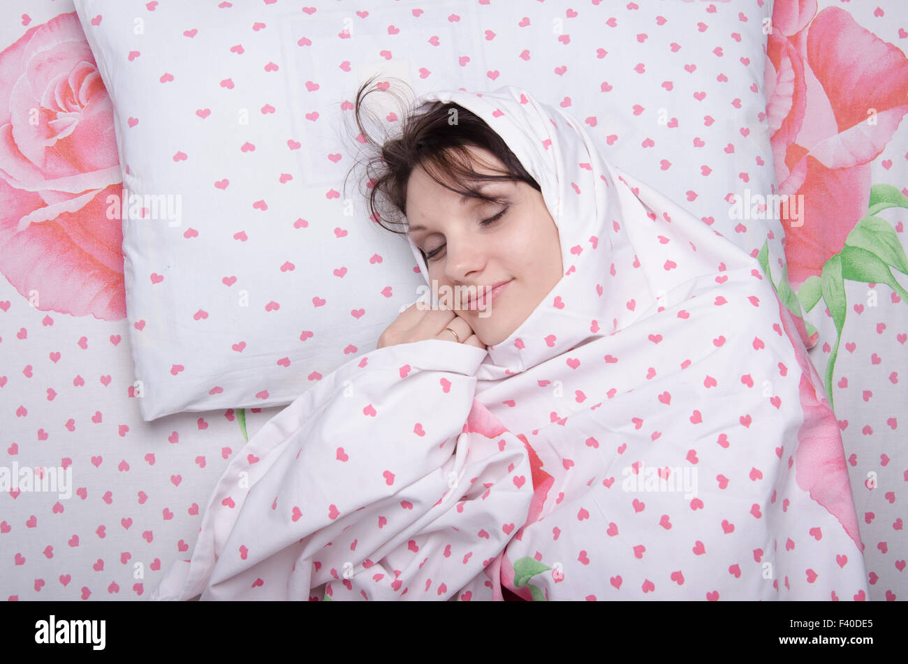 girl wrapped in a blanket Stock Photo
