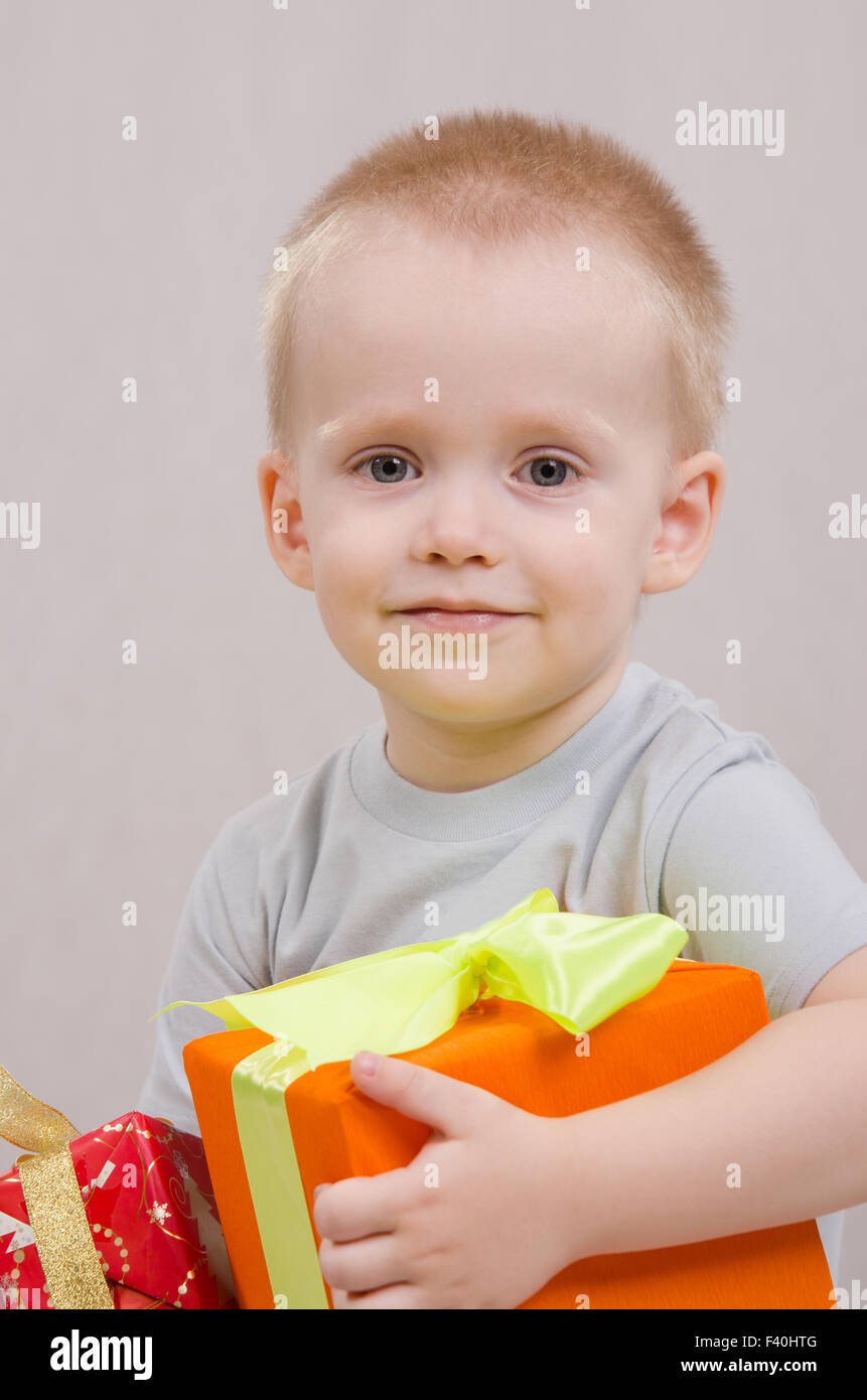 Happy yearold boy with a gift Stock Photo Alamy