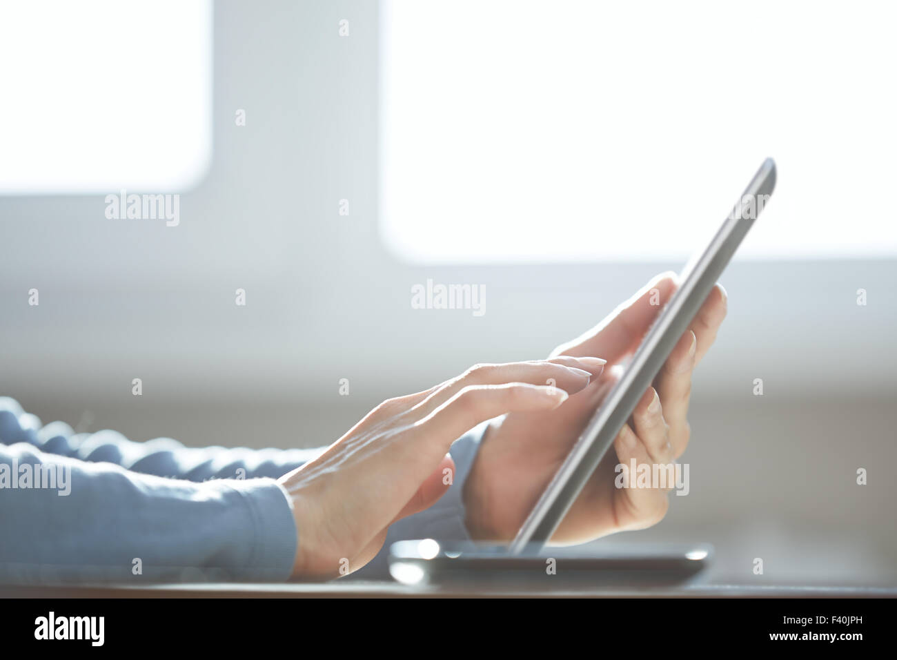 Tablet computer user Stock Photo Alamy