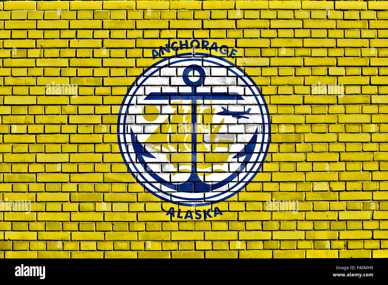 flag of Anchorage painted on brick wall Stock Photo