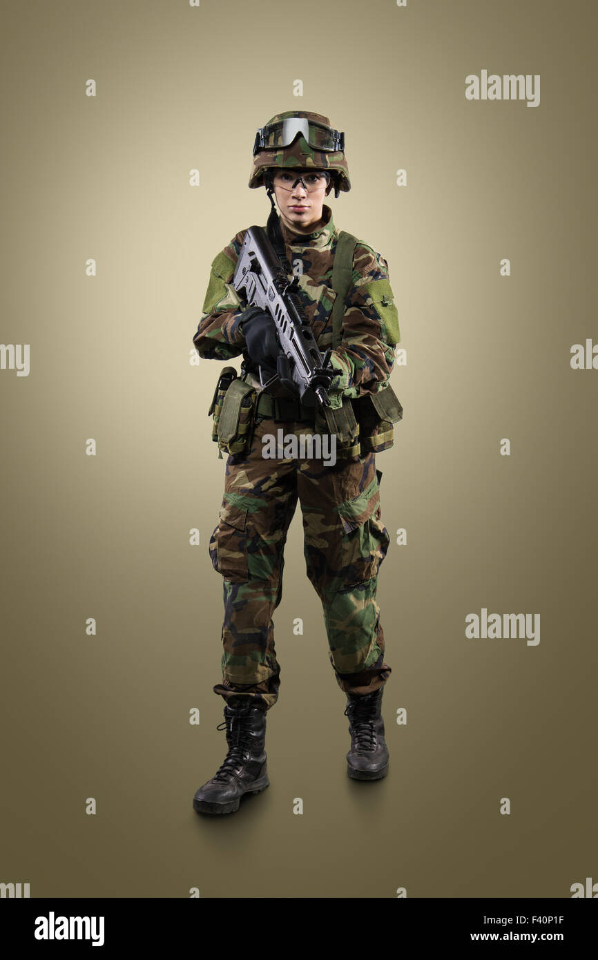 Young soldier with rifle hi-res stock photography and images - Alamy