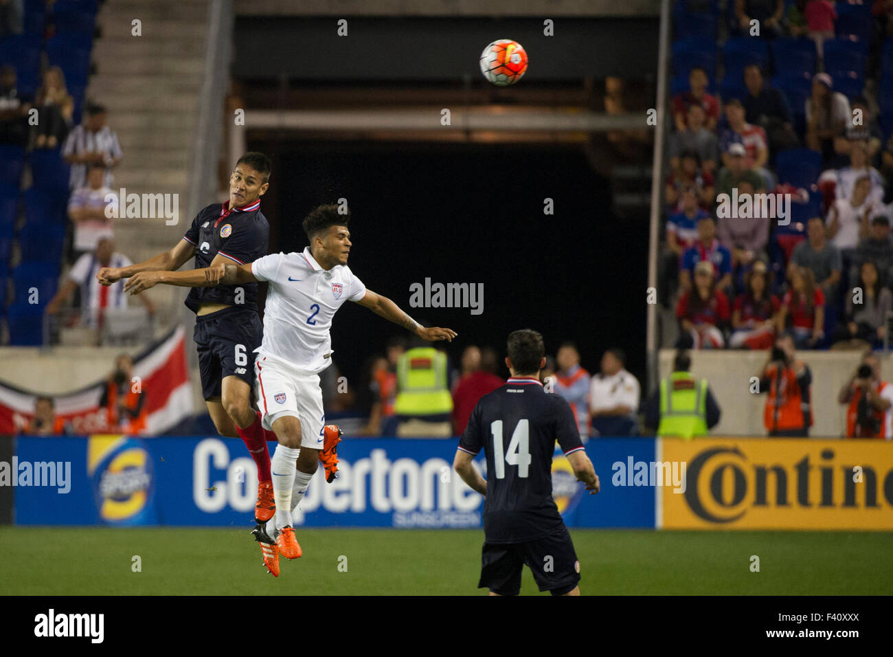 Harrison, NJ, USA. 13th Oct, 2015. US Men's National Team midfielder DeAndre Yedlin (2) heads the ball along with Costa Rica defender Oscar Duarte (6) during The USA Men's National Team vs. Costa Rica Men's National Team- international friendly at Red Bull Arena - Harrison, NJ. Costa Rica defeated The US Men's National Team 1-0. Mandatory Credit: Kostas Lymperopoulos/Cal Sport Media Credit:  Cal Sport Media/Alamy Live News Stock Photo