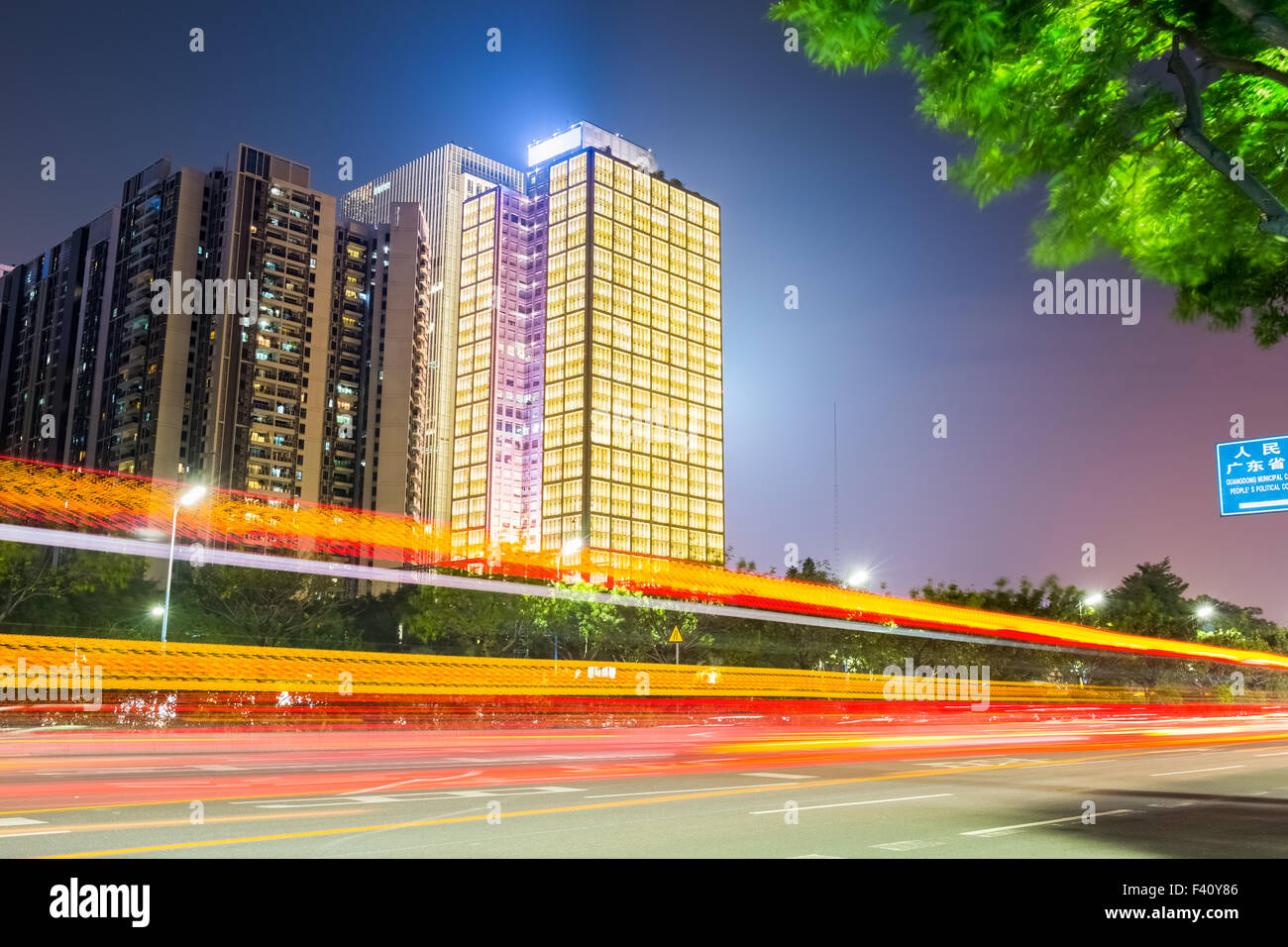 fiery light trails on the city road Stock Photo