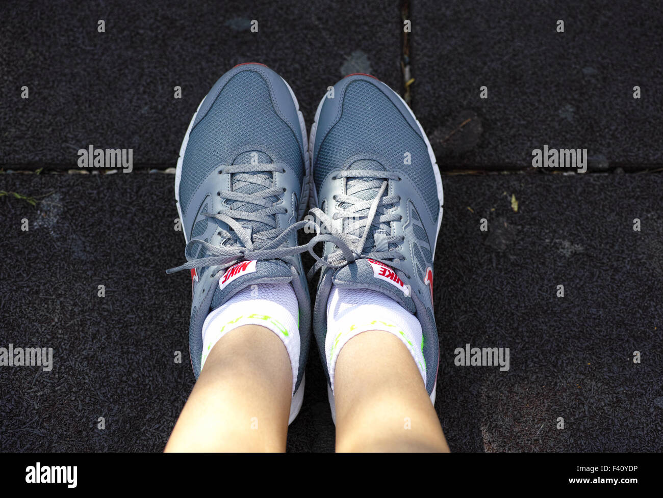 Paphos, Cyprus - October 09, 2015 Nike Downshifter running shoes on woman  feet Stock Photo - Alamy