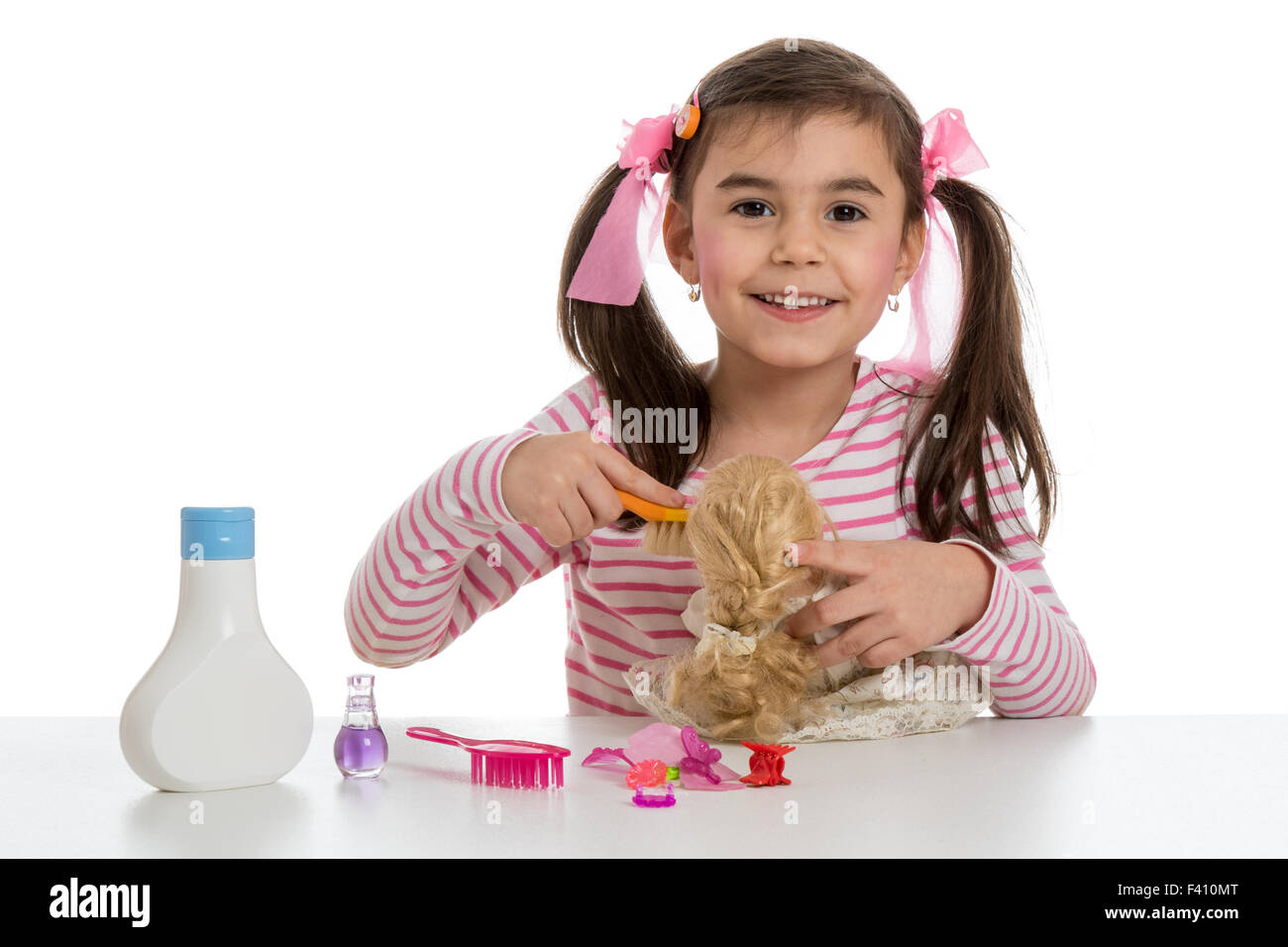 girl playing with doll Stock Photo - Alamy