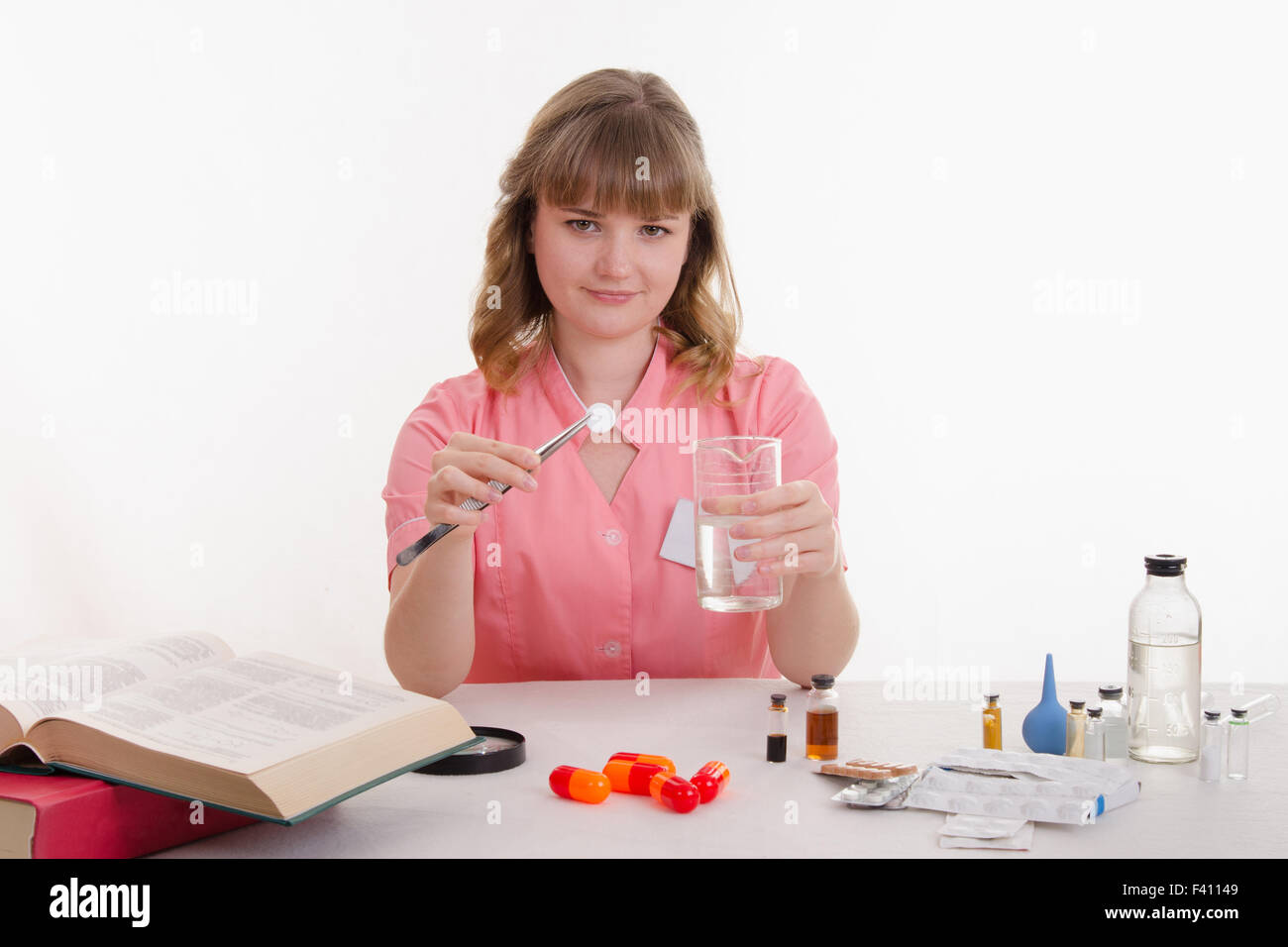 The pharmacist conducts experiments Stock Photo