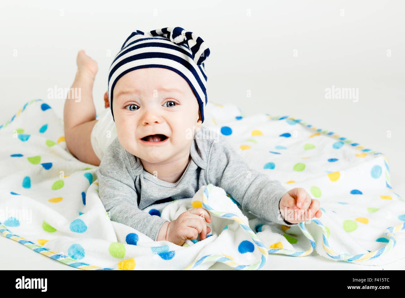 Adorable baby screaming Stock Photo