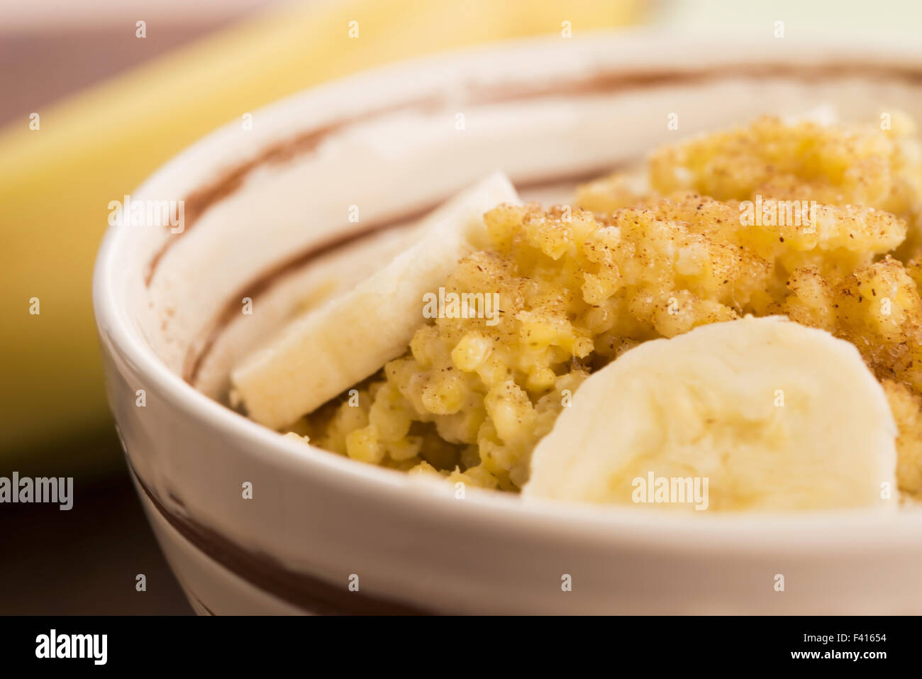 Fresh millet porridge with banana Stock Photo Alamy