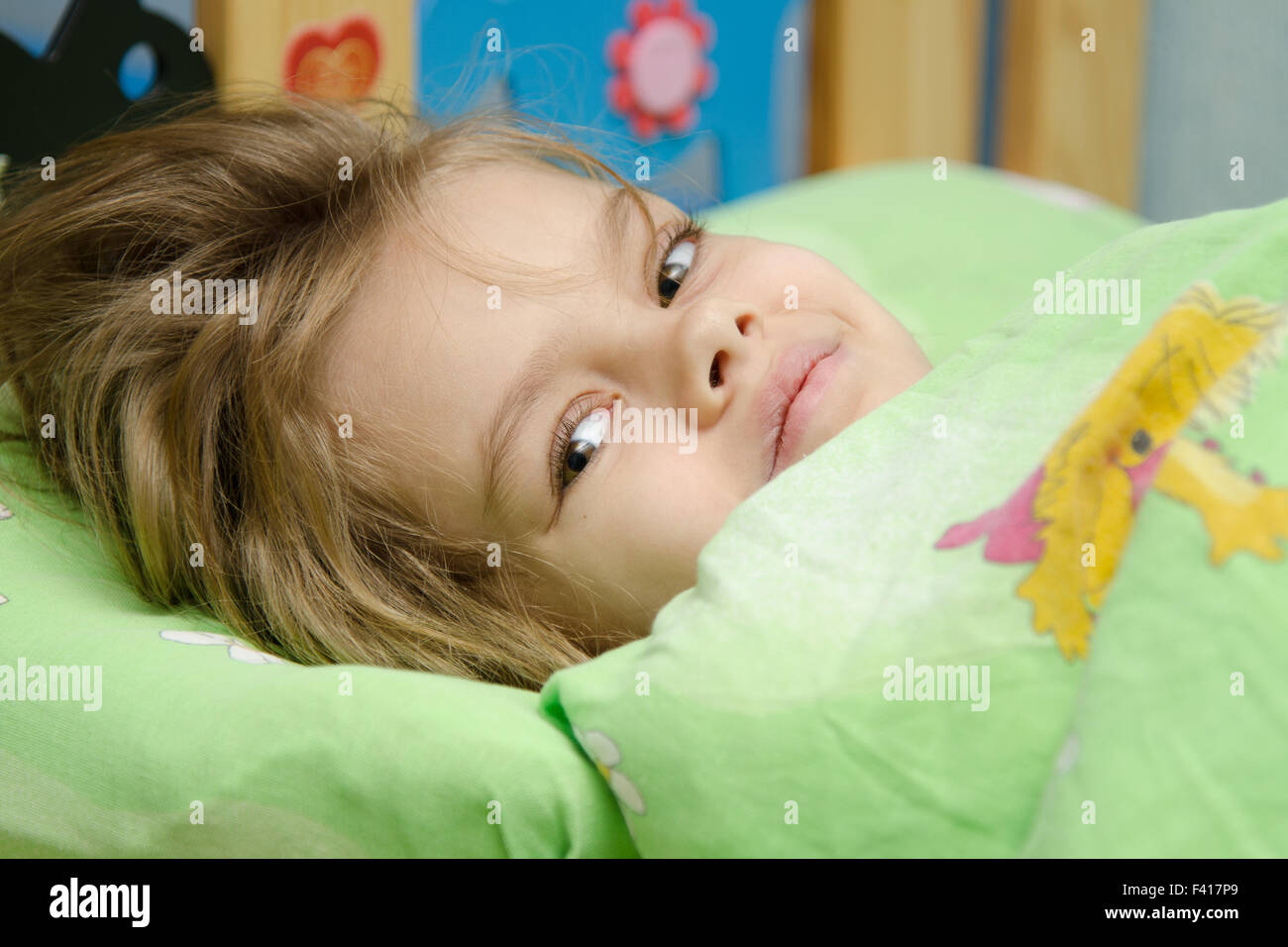 The girl woke up in bed Stock Photo