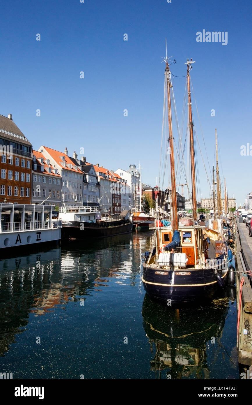 View of canal at Copenhagen, Denmark, showing boats and buildings Stock Photo