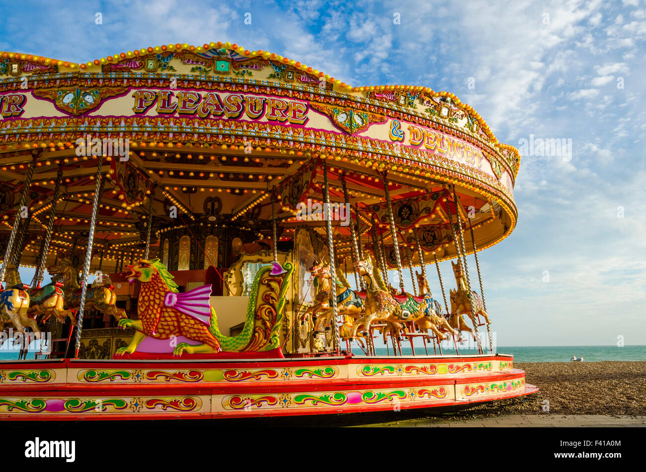 The merry-go-round on Brighton Beach, East Sussex, England. Stock Photo