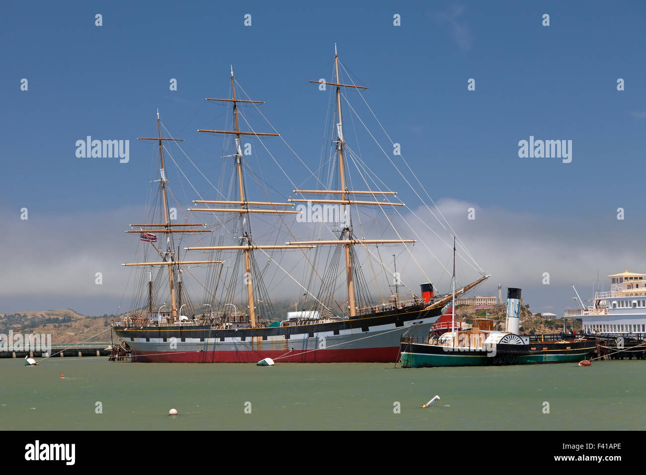 Steamer and vintage clipper in the port Stock Photo