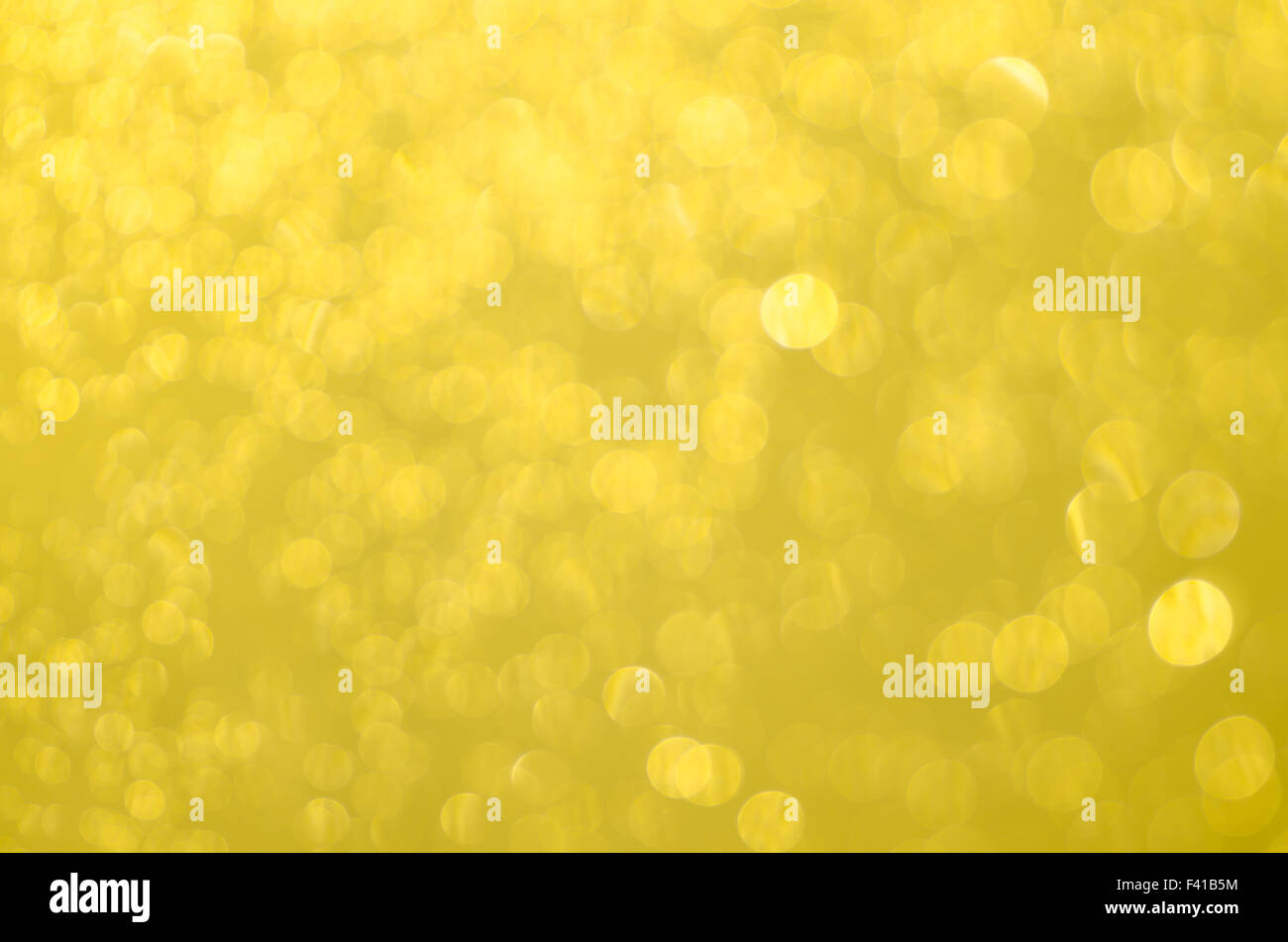 golden abstract blurred bokeh lights background Stock Photo - Alamy
