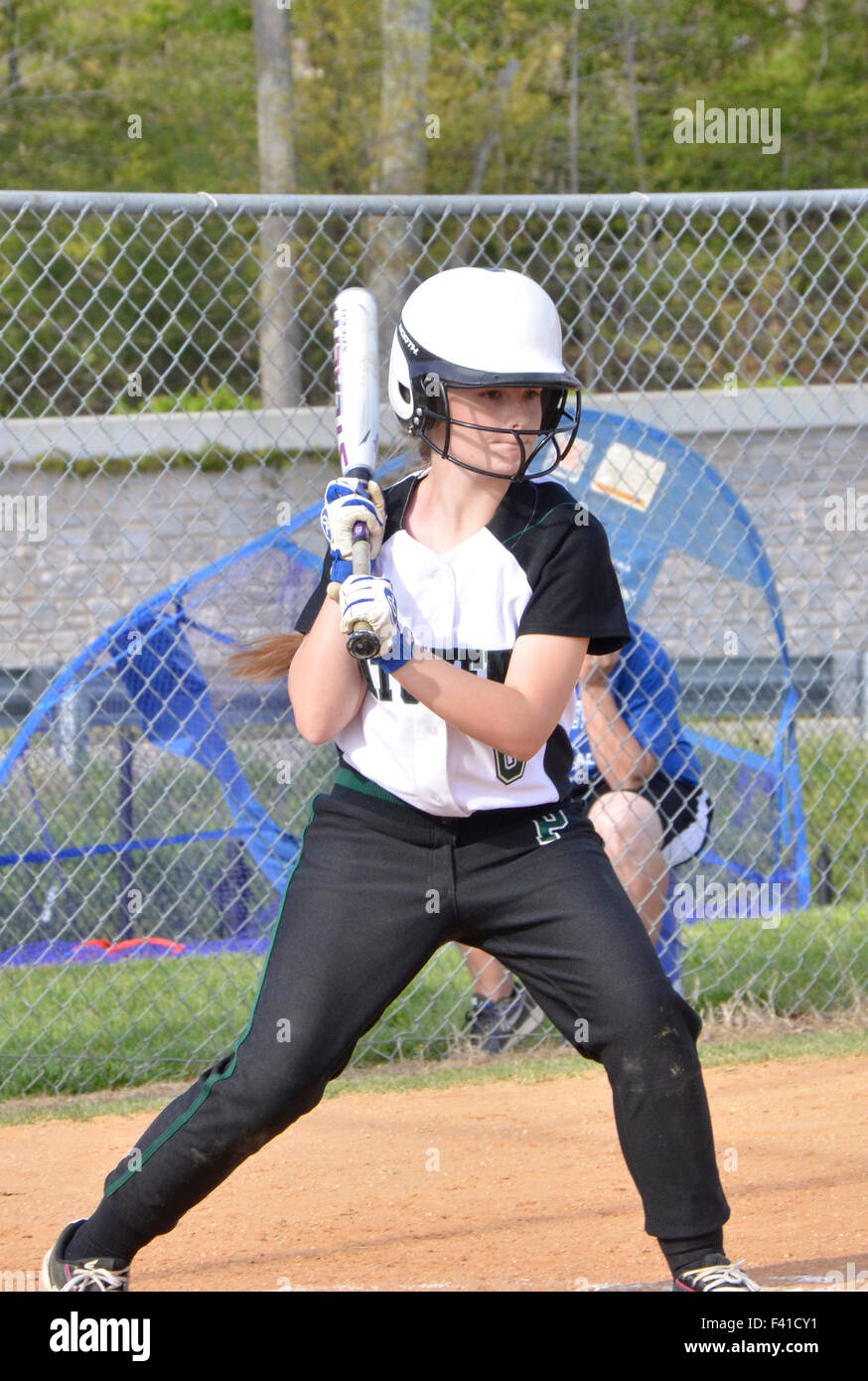 female batter in a high school softball game Stock Photo Alamy
