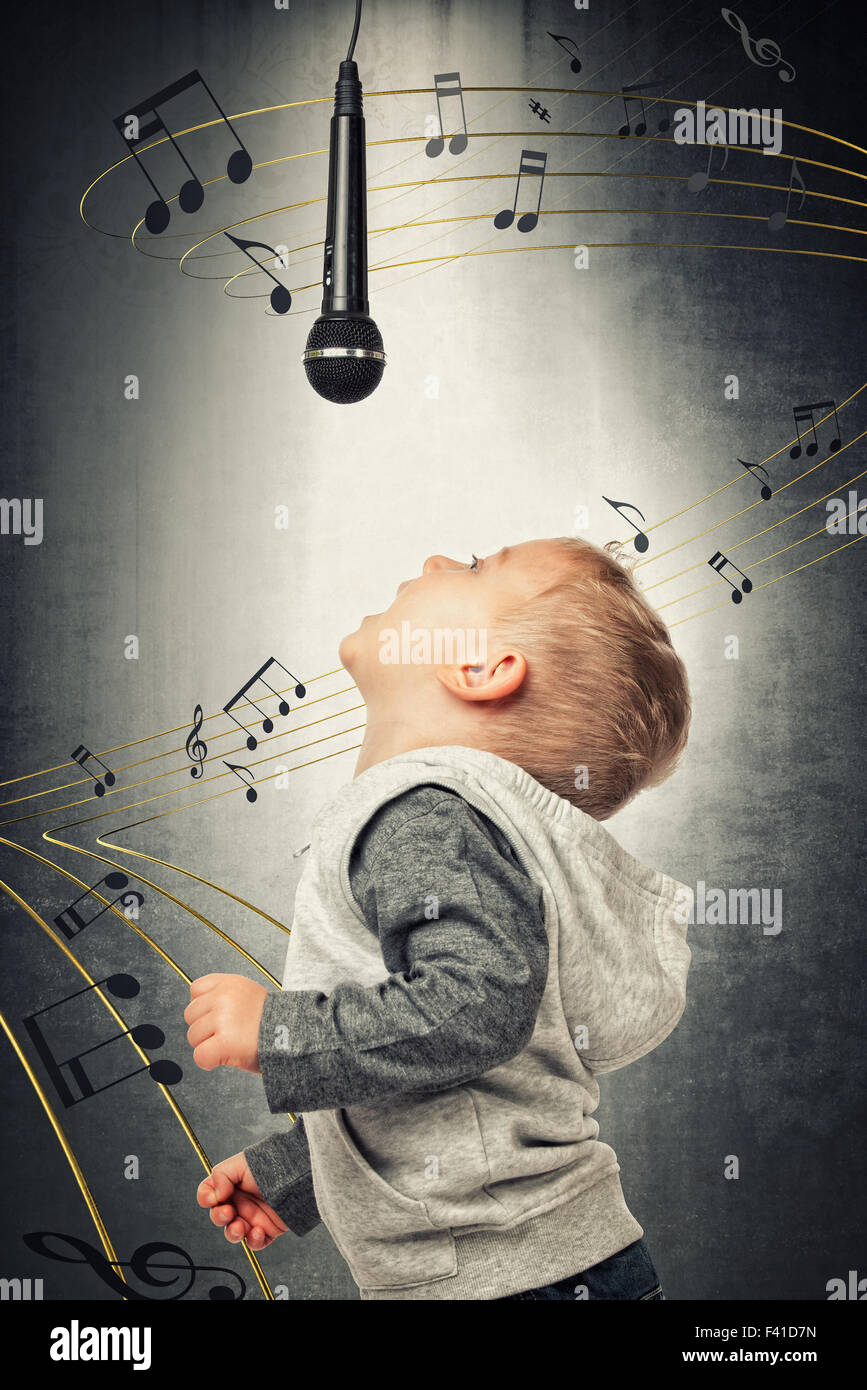 portrait of little singer and 3d abstract music background Stock Photo