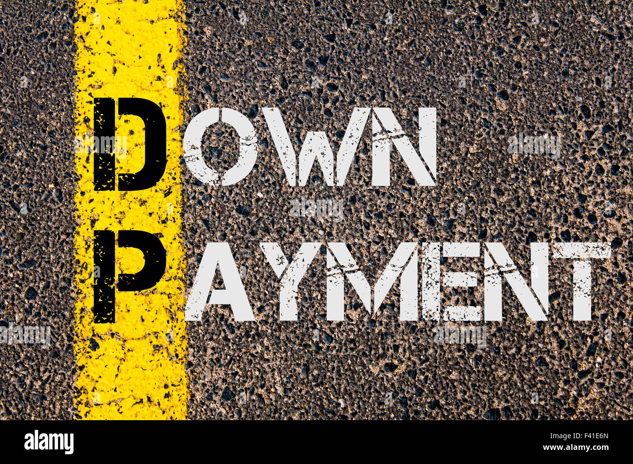 Concept image of Business Acronym DP as DOWN PAYMENT written over road marking yellow paint line. Stock Photo