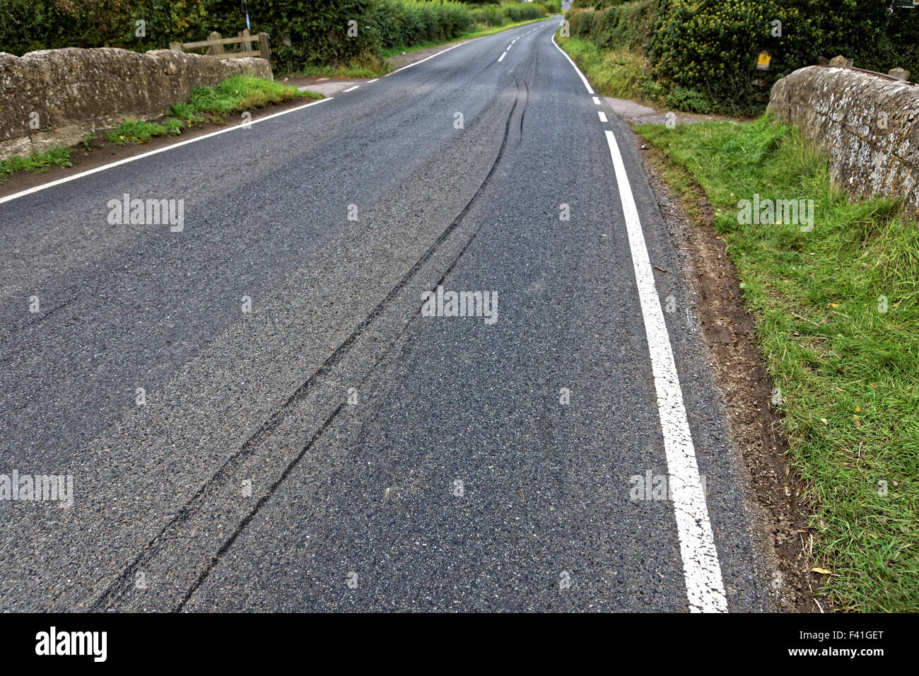 Longs skid marks on road. Stock Photo