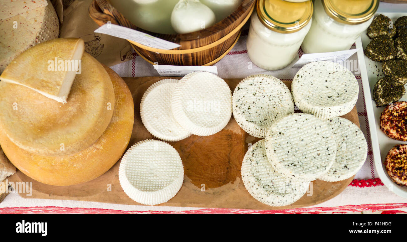 Handmade local cheese assortment, on a fair of traditional products, in Miercurea-Ciuc, Harghita, Romania. Stock Photo