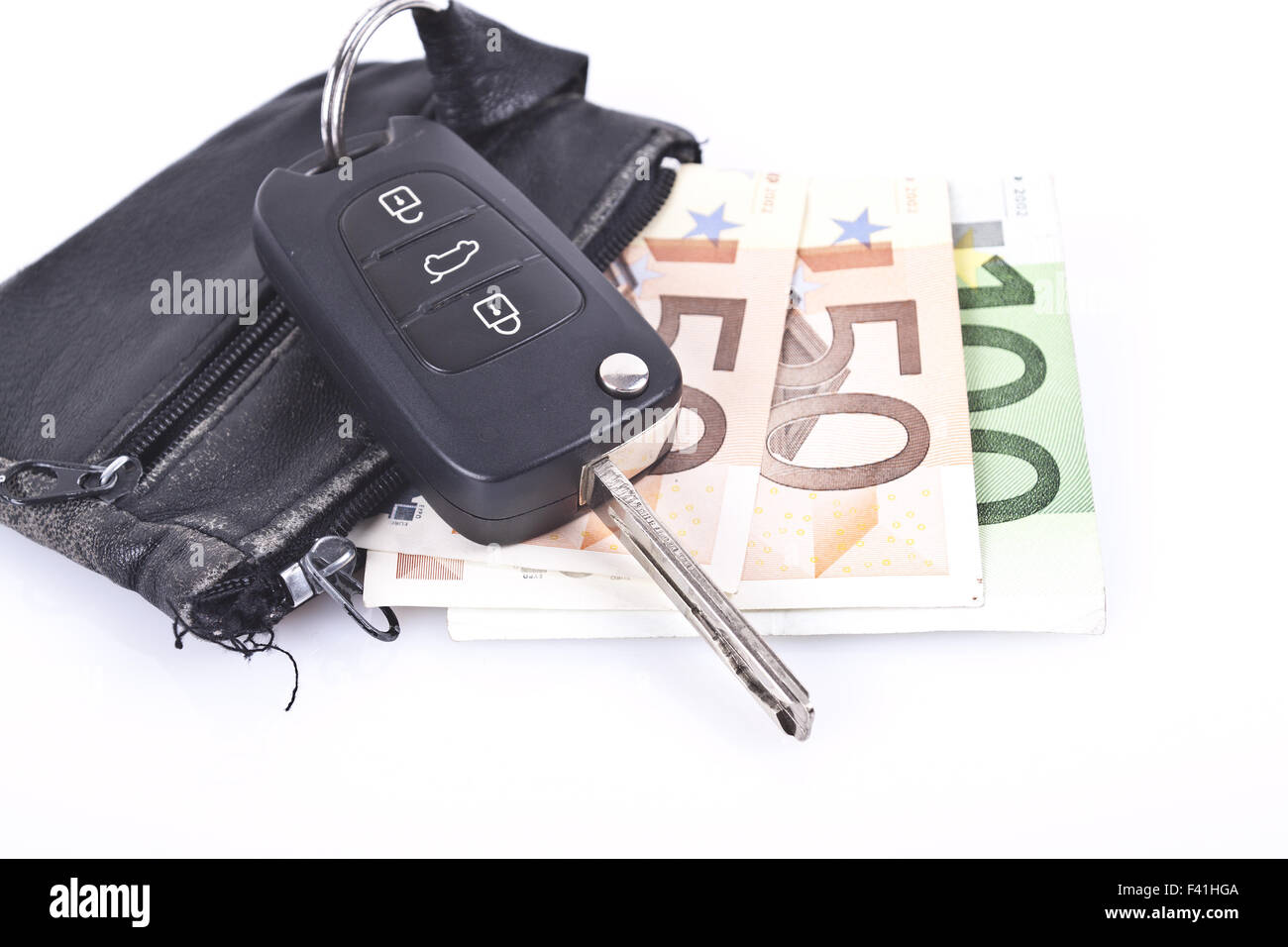 Car keys with money Stock Photo