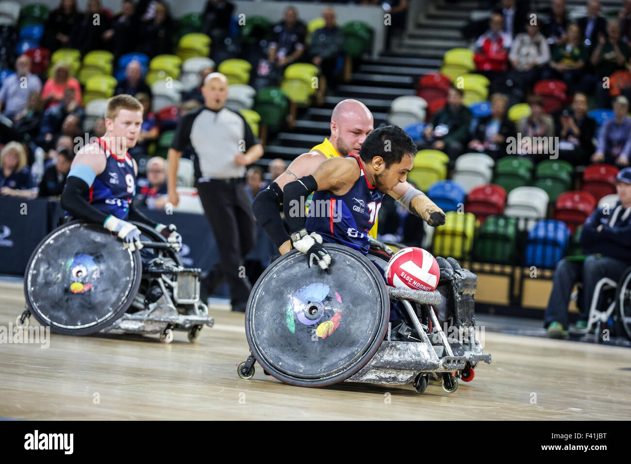 London, UK. 13th Oct, 2015. Australia defeated team GB 57-55 in the World Wheelchair Rugby Challenge at the Copper Box, Queen Elizabeth Olympic Park, London, UK. UK.Aus no 10 Chris bond chases GB no 10 Ayaz Bhuta who has the ball. 13th October, 2015. Credit:  carol moir/Alamy Live News Stock Photo