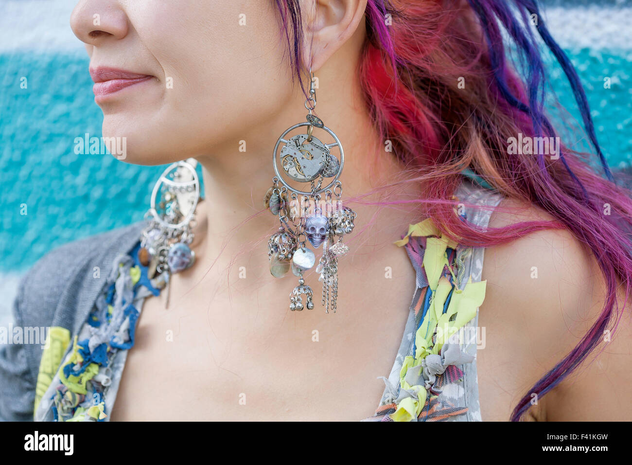 Close-up of young beautiful girl in harajuku style wearing steam punk style earrings Stock Photo