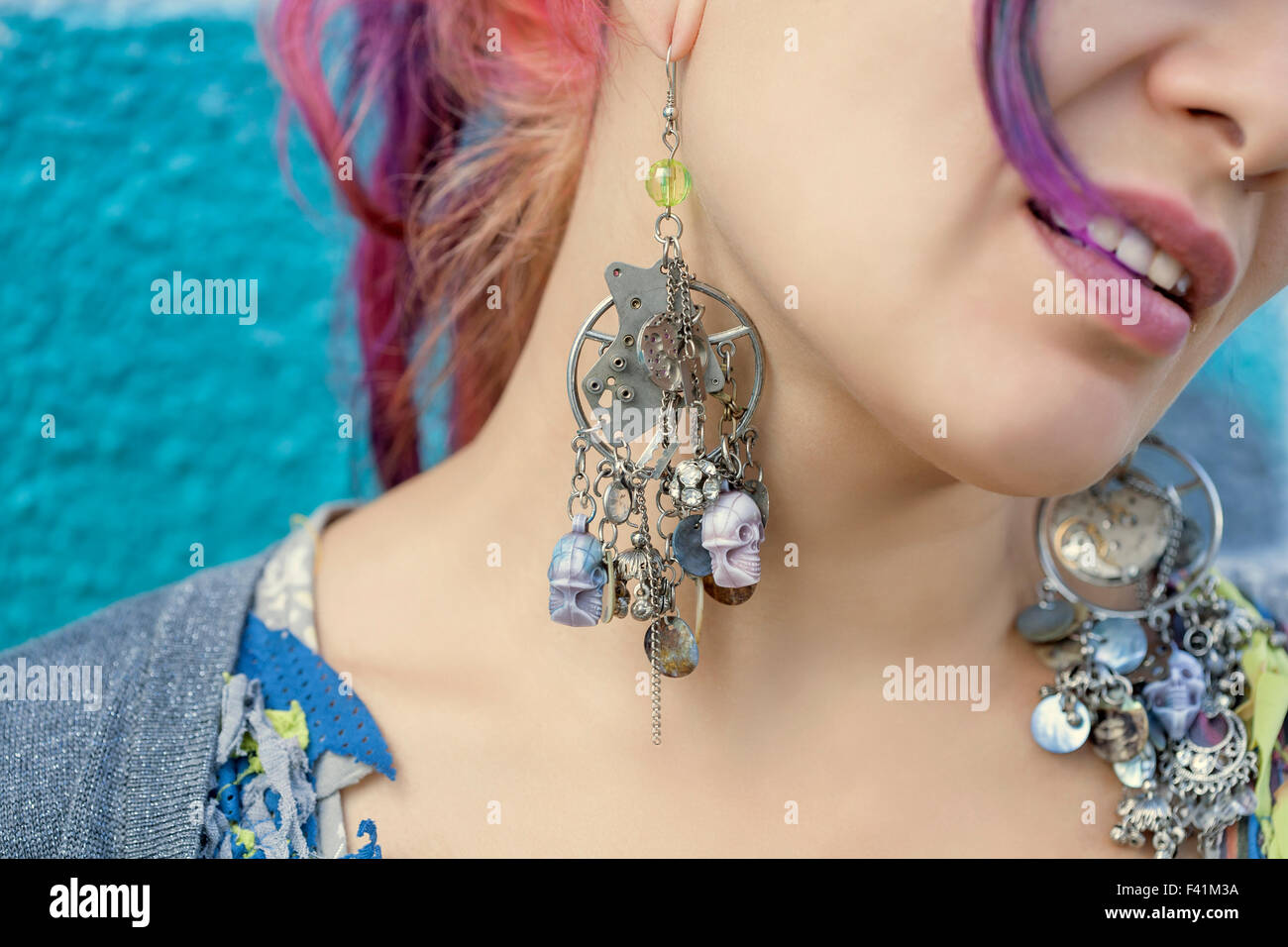 Close-up of young beautiful girl in harajuku style wearing steam punk style earrings Stock Photo