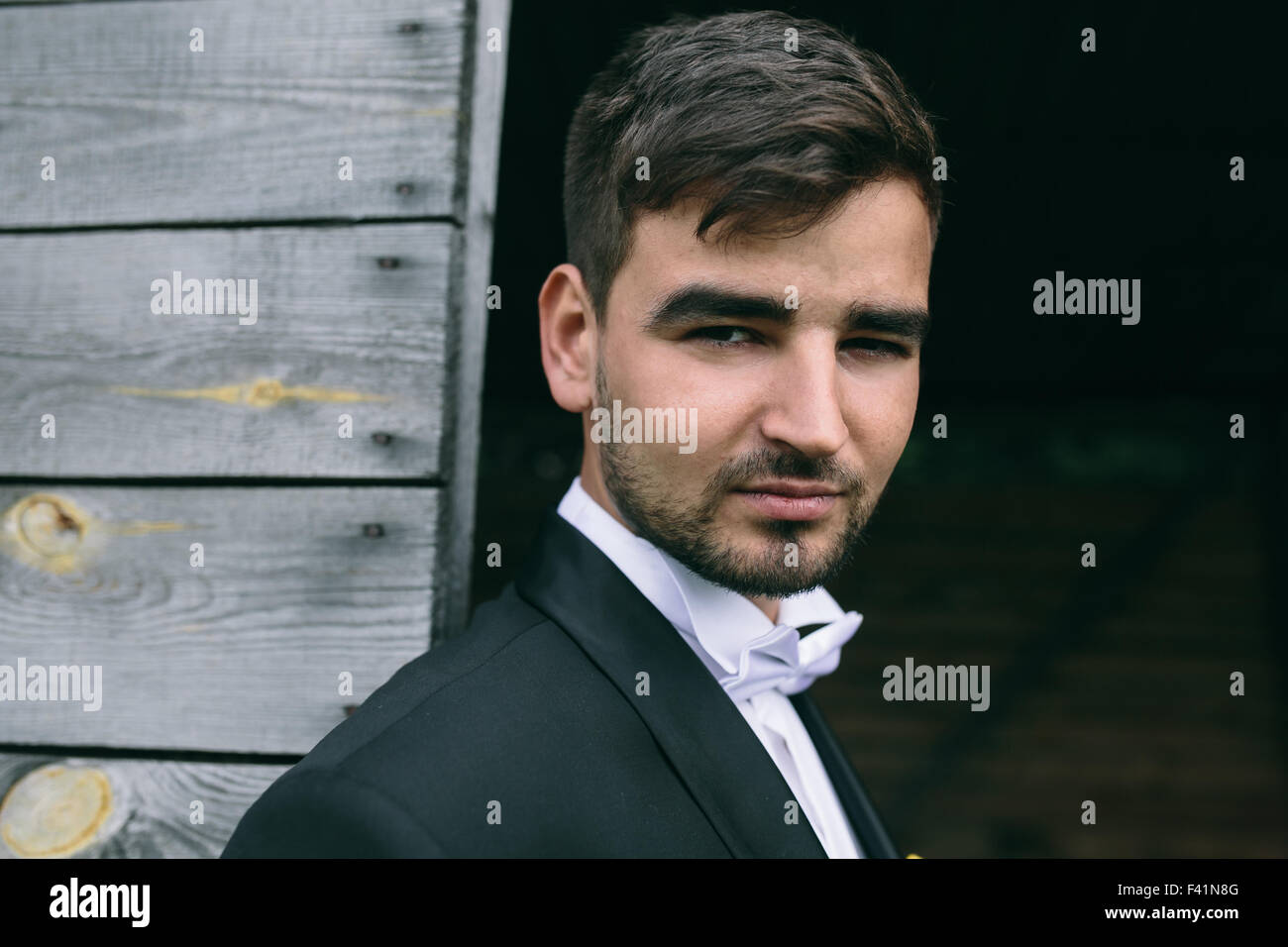 Handsome smiling groom close hi-res stock photography and images - Alamy