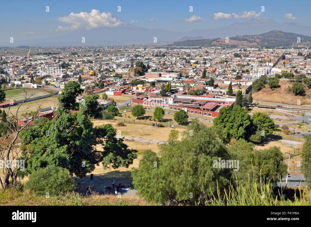 View from the Pyramid Tepanapa to the city of Cholula, Mount Popocatepetl behind, Itztaccihuatl on the right, Puebla, Mexico Stock Photo