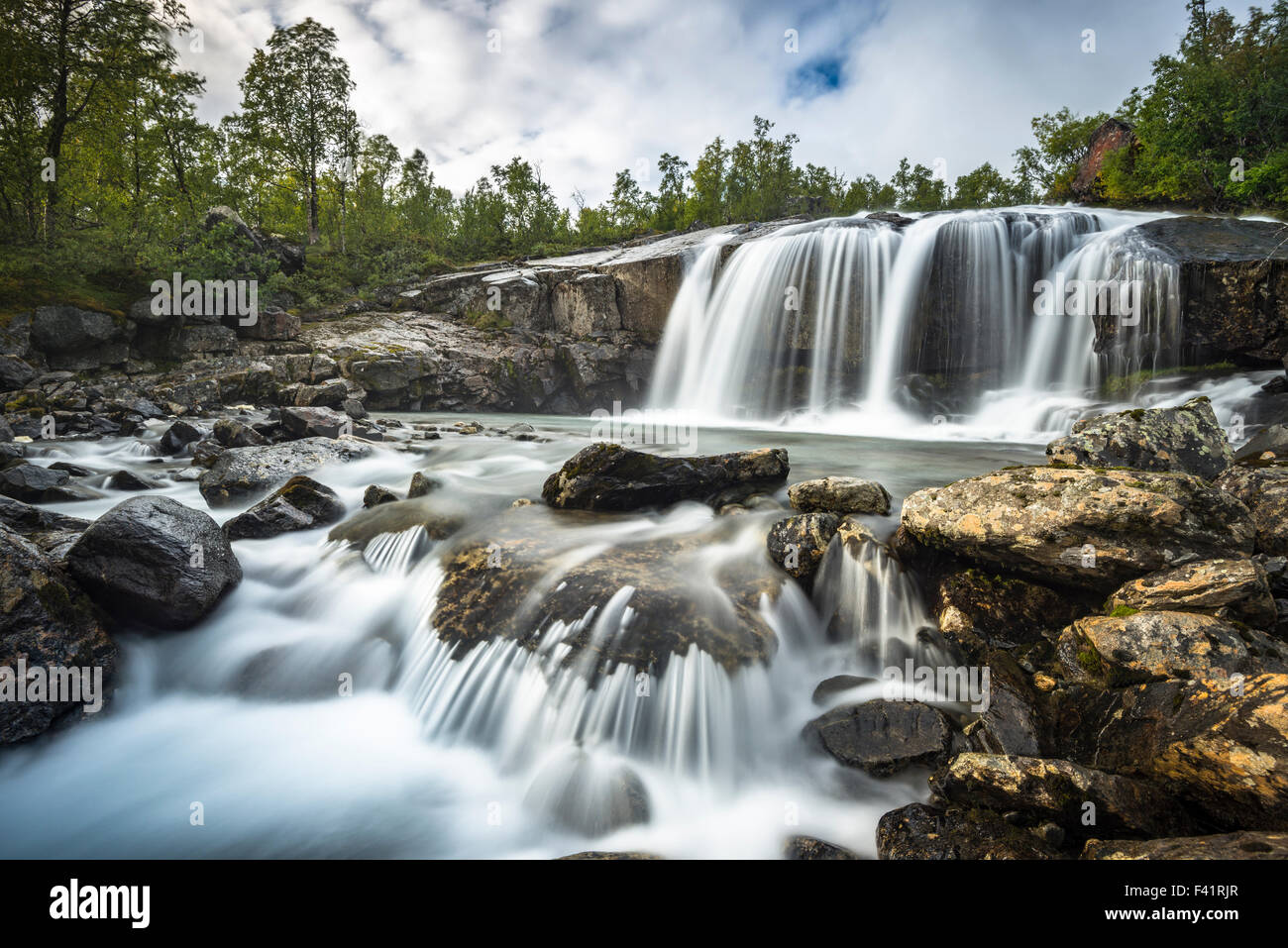 Waterfall in Stora Sjöfallet National Park, Norrbotten, Lapland, Sweden Stock Photo
