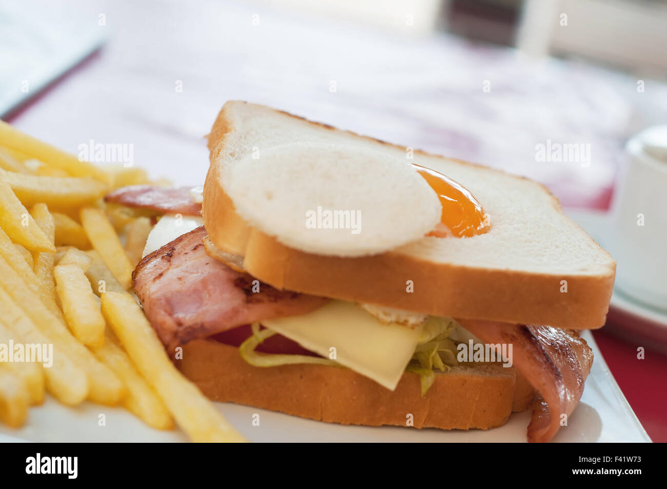 Sandwich with egg french fries Stock Photo